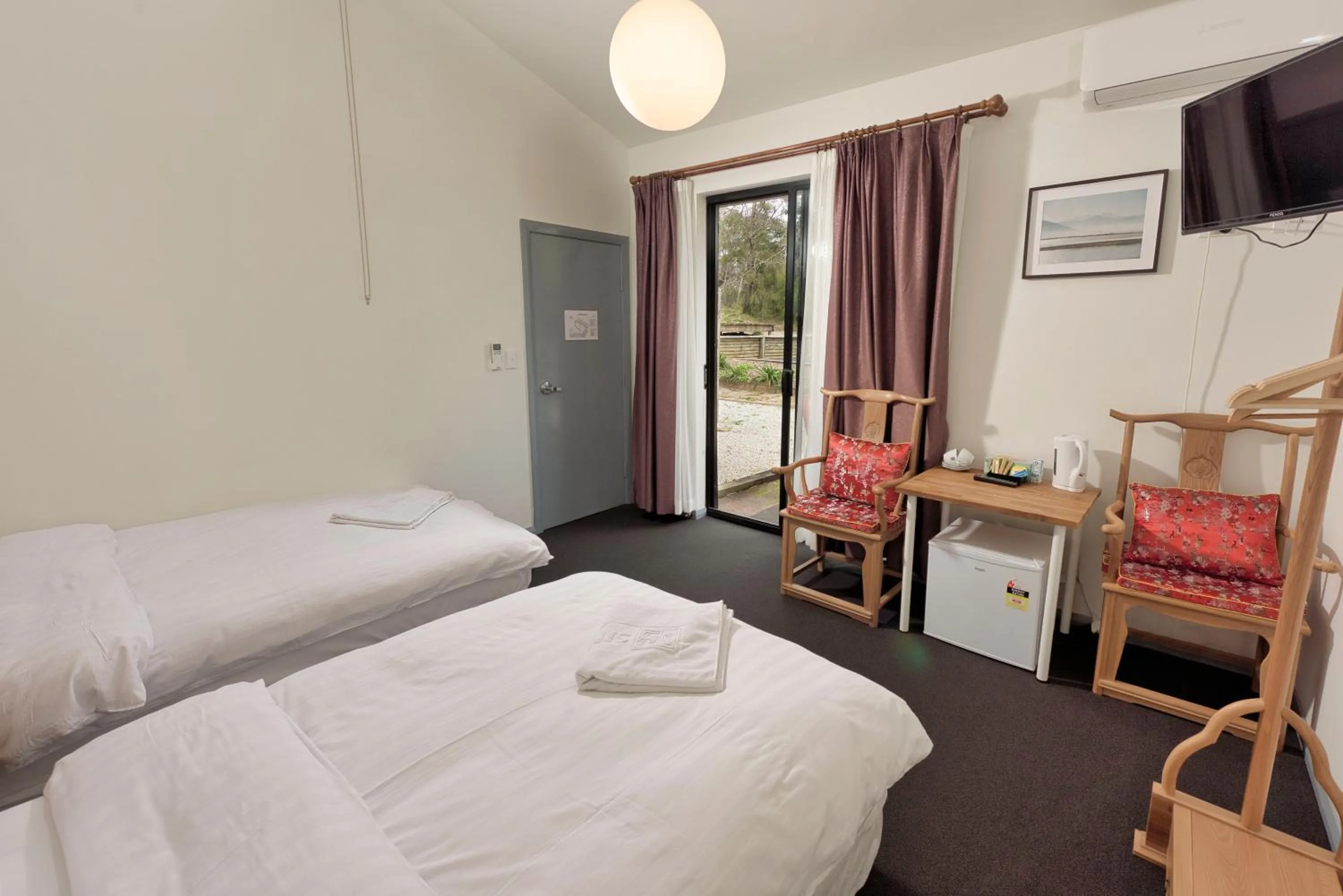 Bed in Sinofield Edu-Retreat