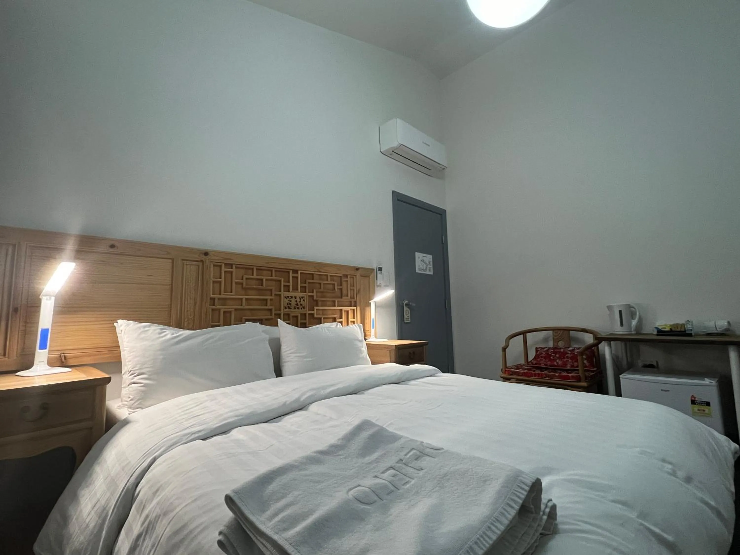 Bed in Sinofield Edu-Retreat