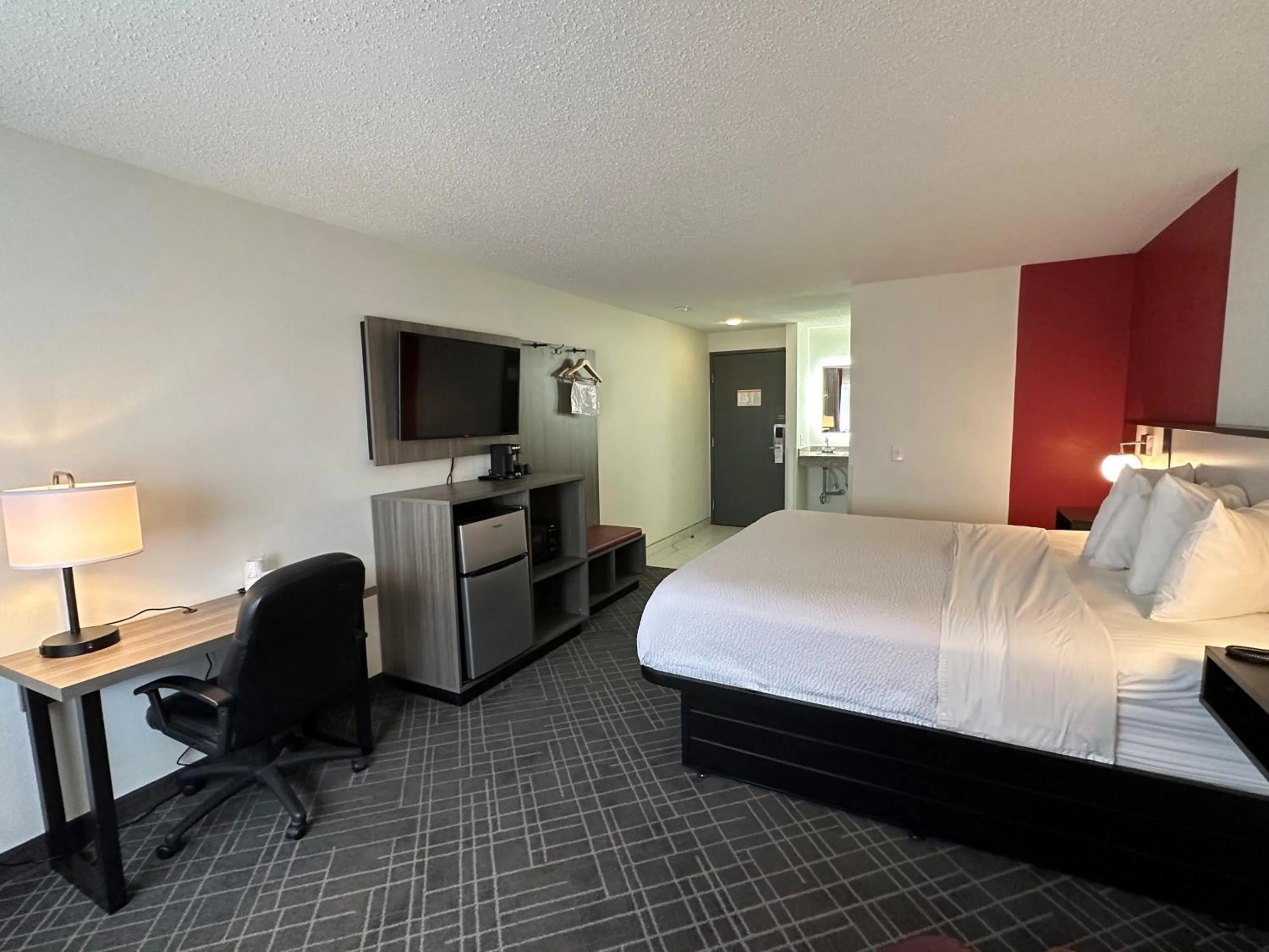 Bed in Ramada by Wyndham Waupaca