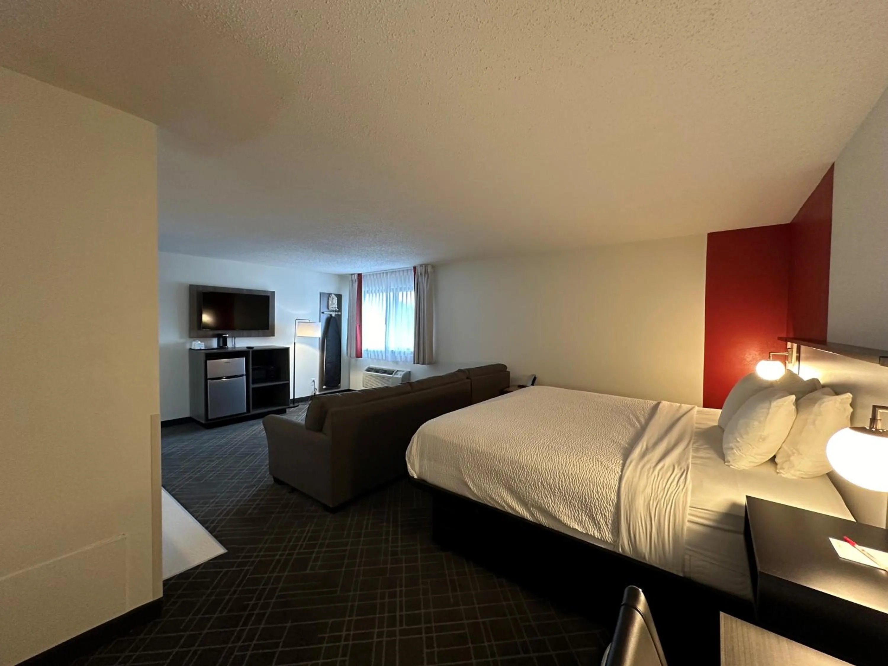 Bed in Ramada by Wyndham Waupaca