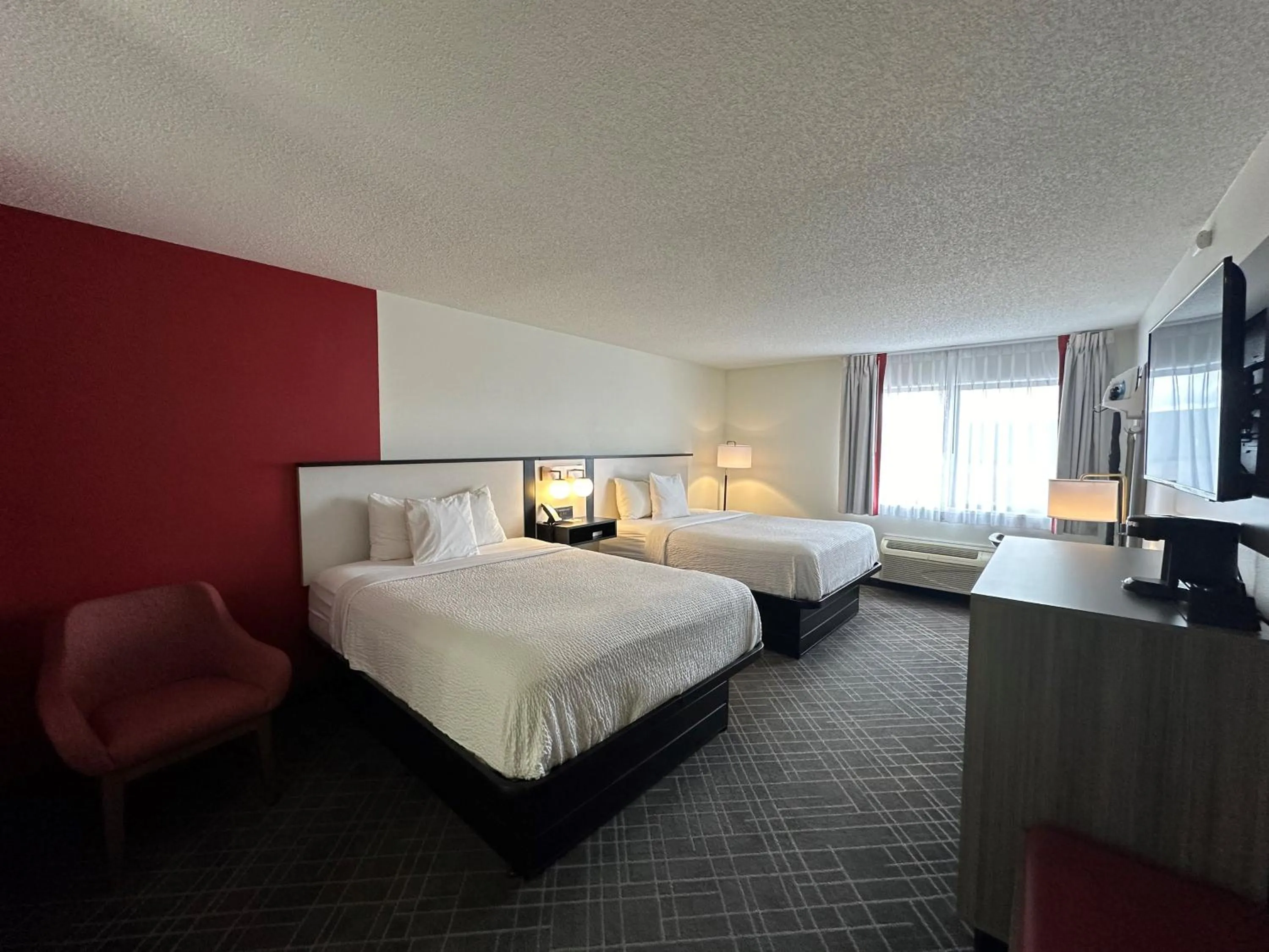 Bed in Ramada by Wyndham Waupaca