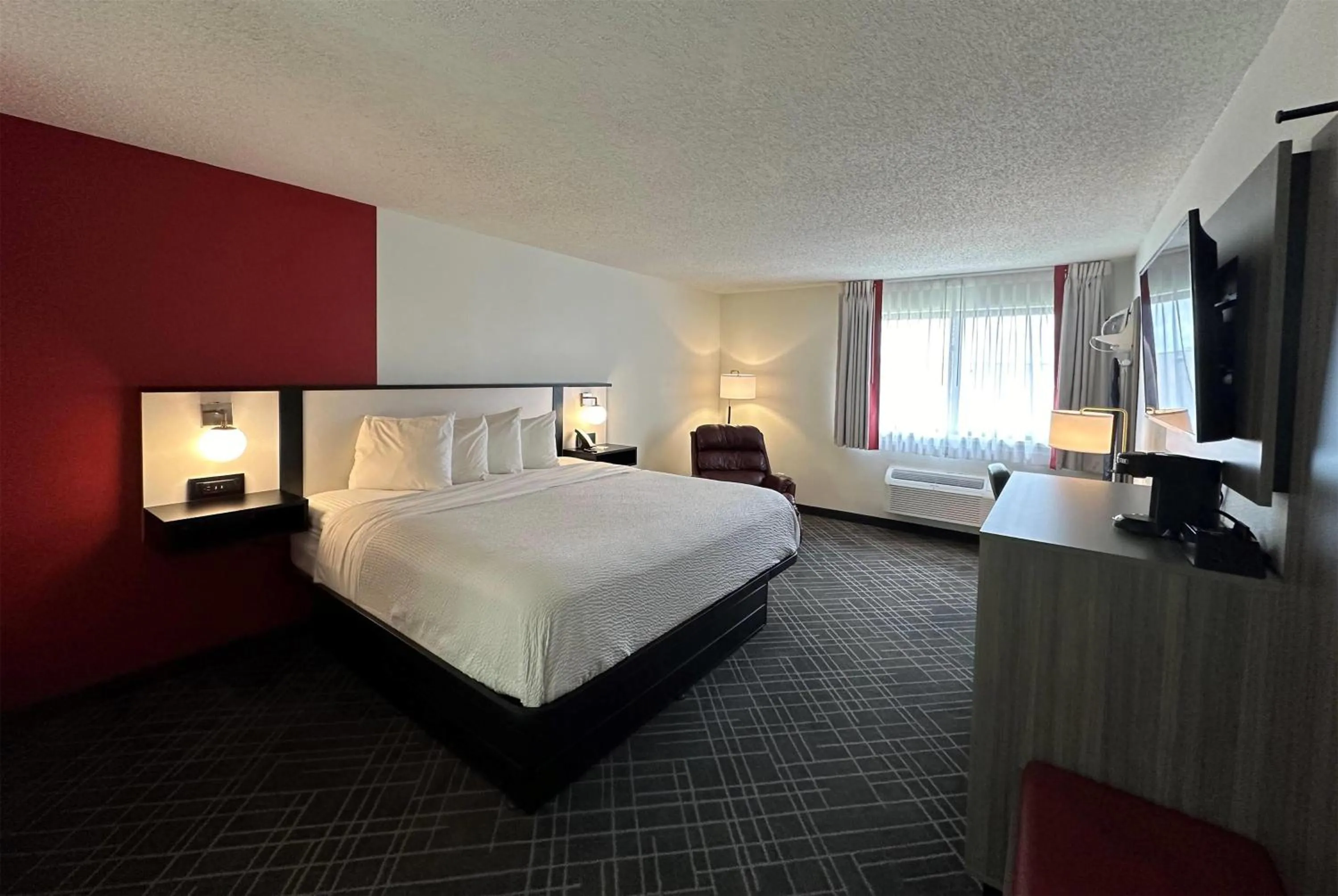 Photo of the whole room, Bed in Ramada by Wyndham Waupaca