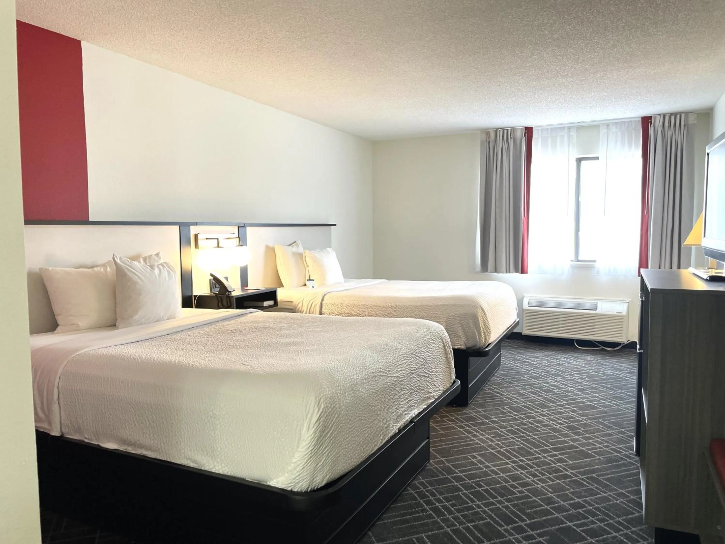 Bed in Ramada by Wyndham Waupaca