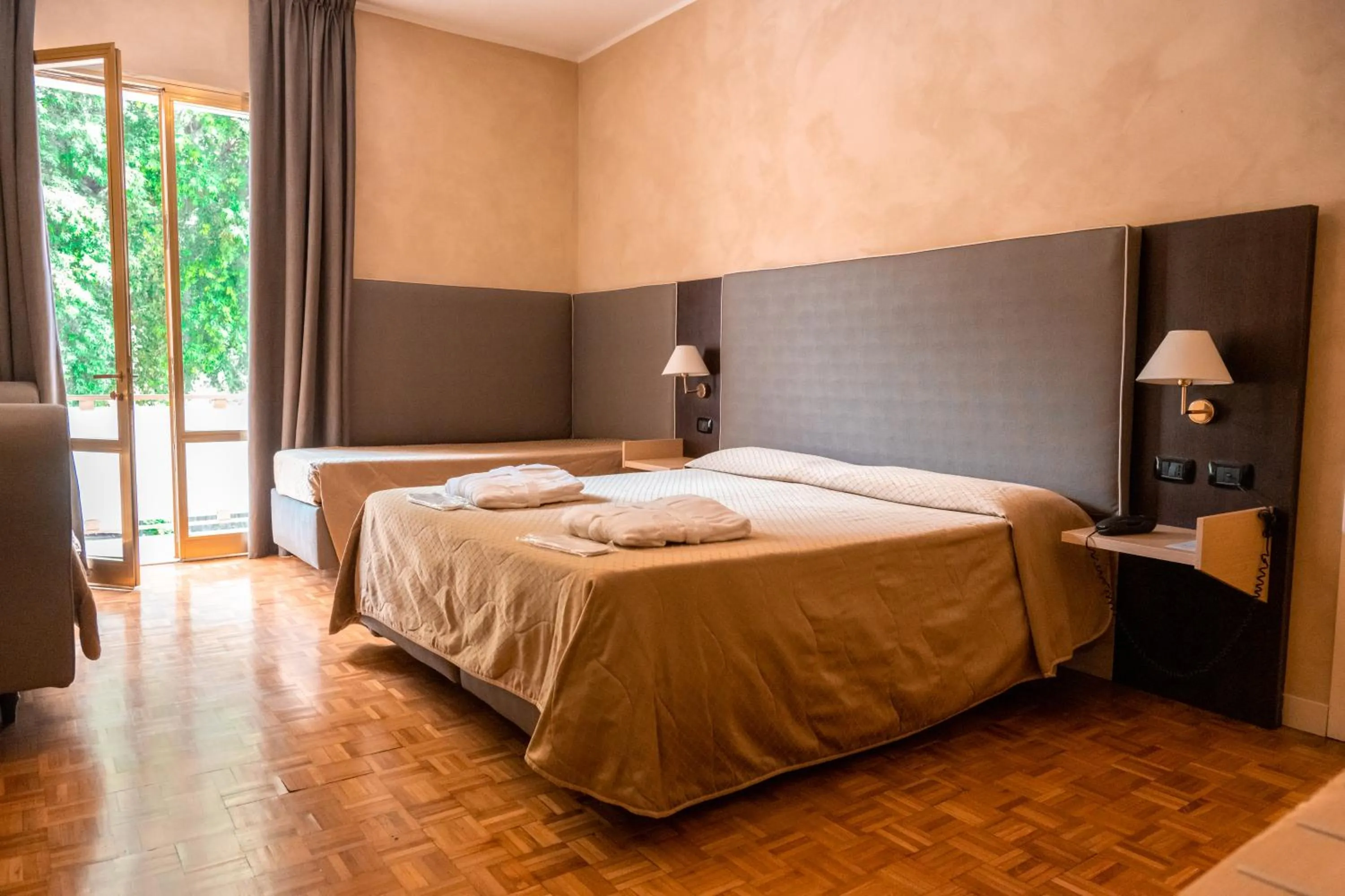Bed in Hotel Terme Pellegrini