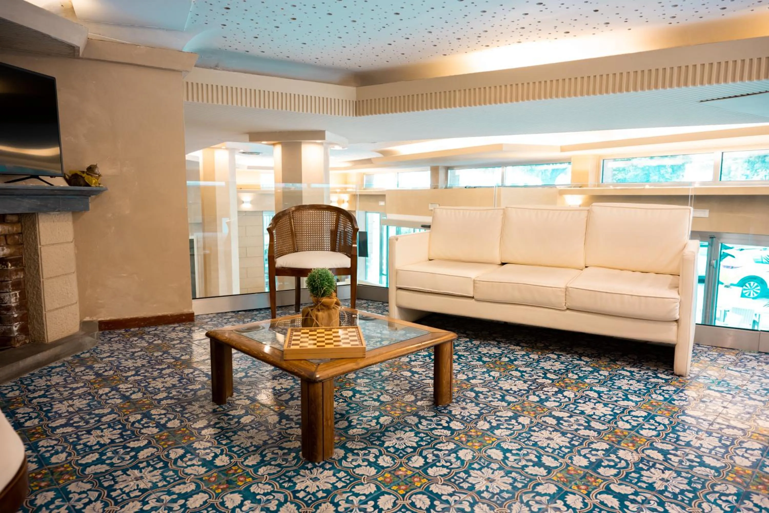 Communal lounge/ TV room in Hotel Terme Pellegrini