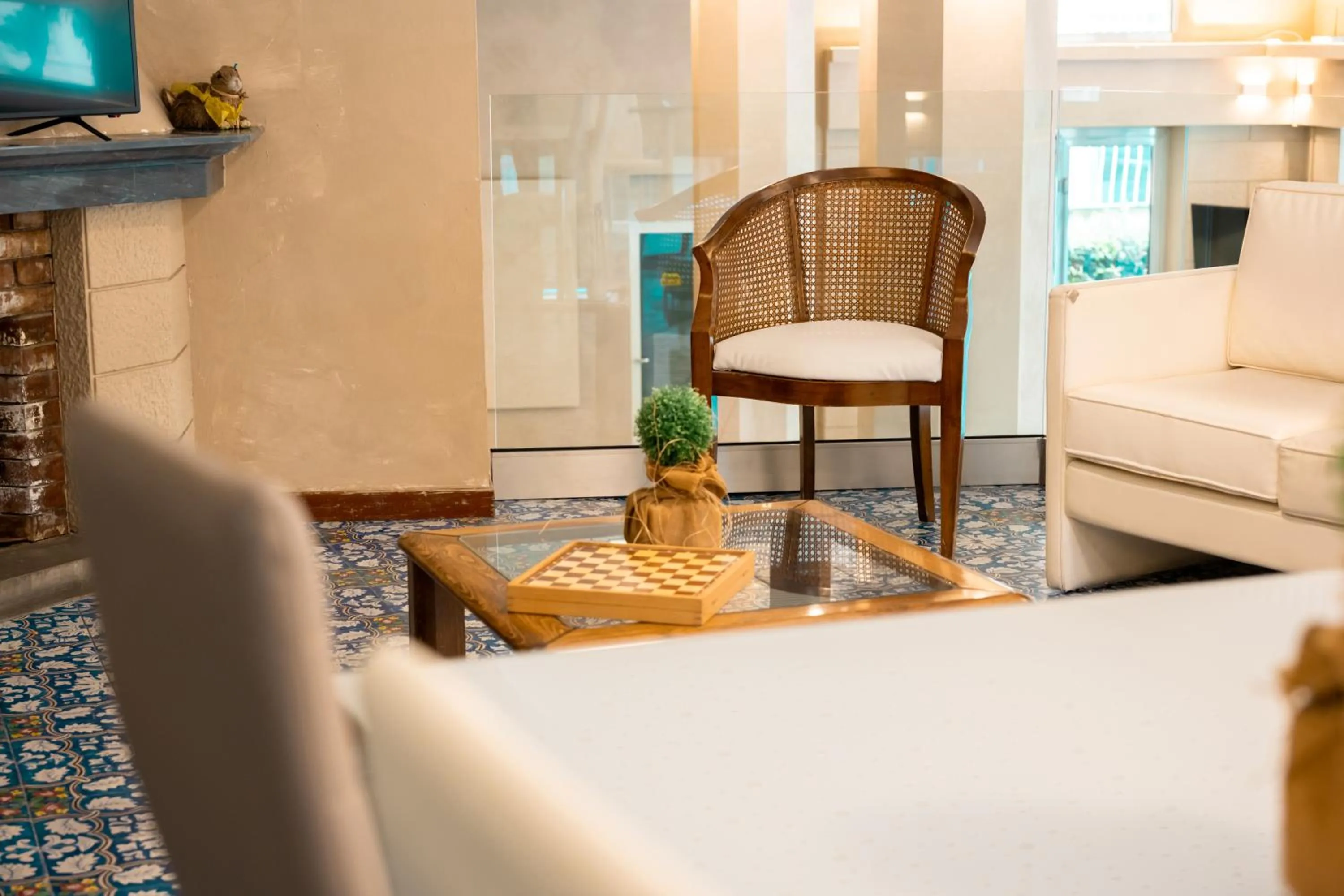 Communal lounge/ TV room in Hotel Terme Pellegrini