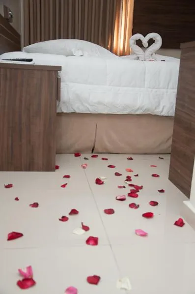 Bed in Plaza Suite Hotel