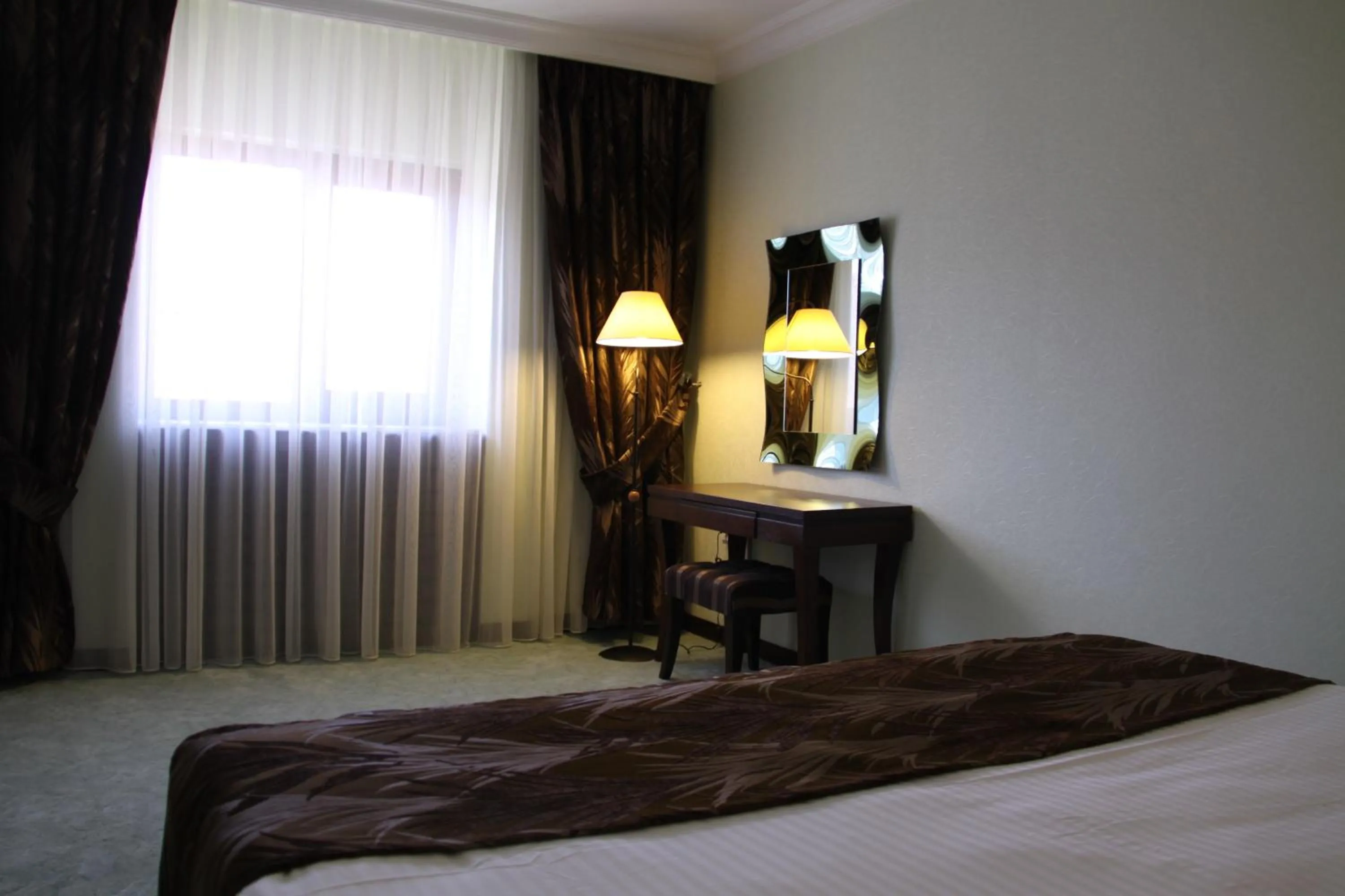 Bed in Asrin Park Hotel & Spa Convention Center