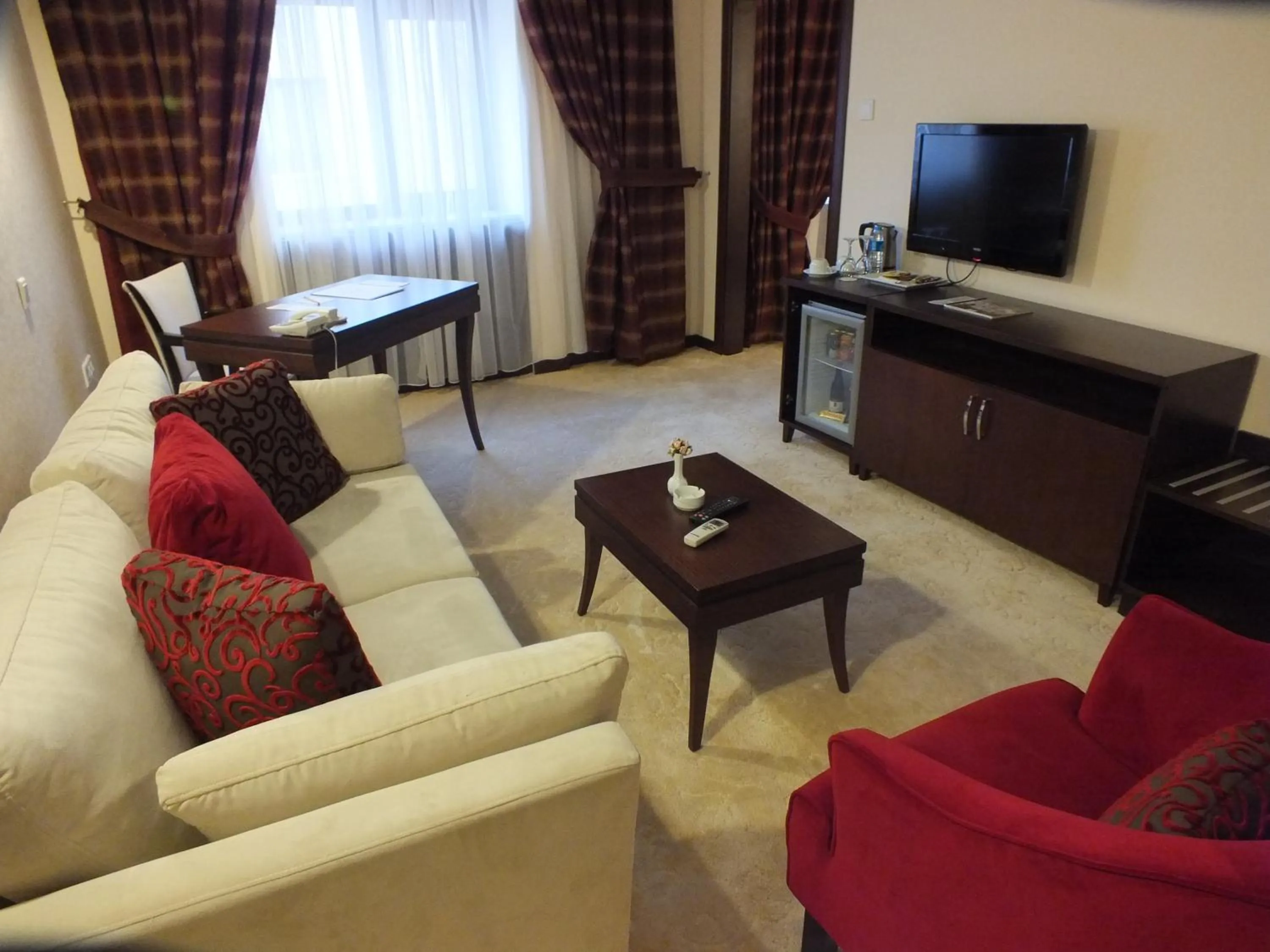 Communal lounge/ TV room in Asrin Park Hotel & Spa Convention Center