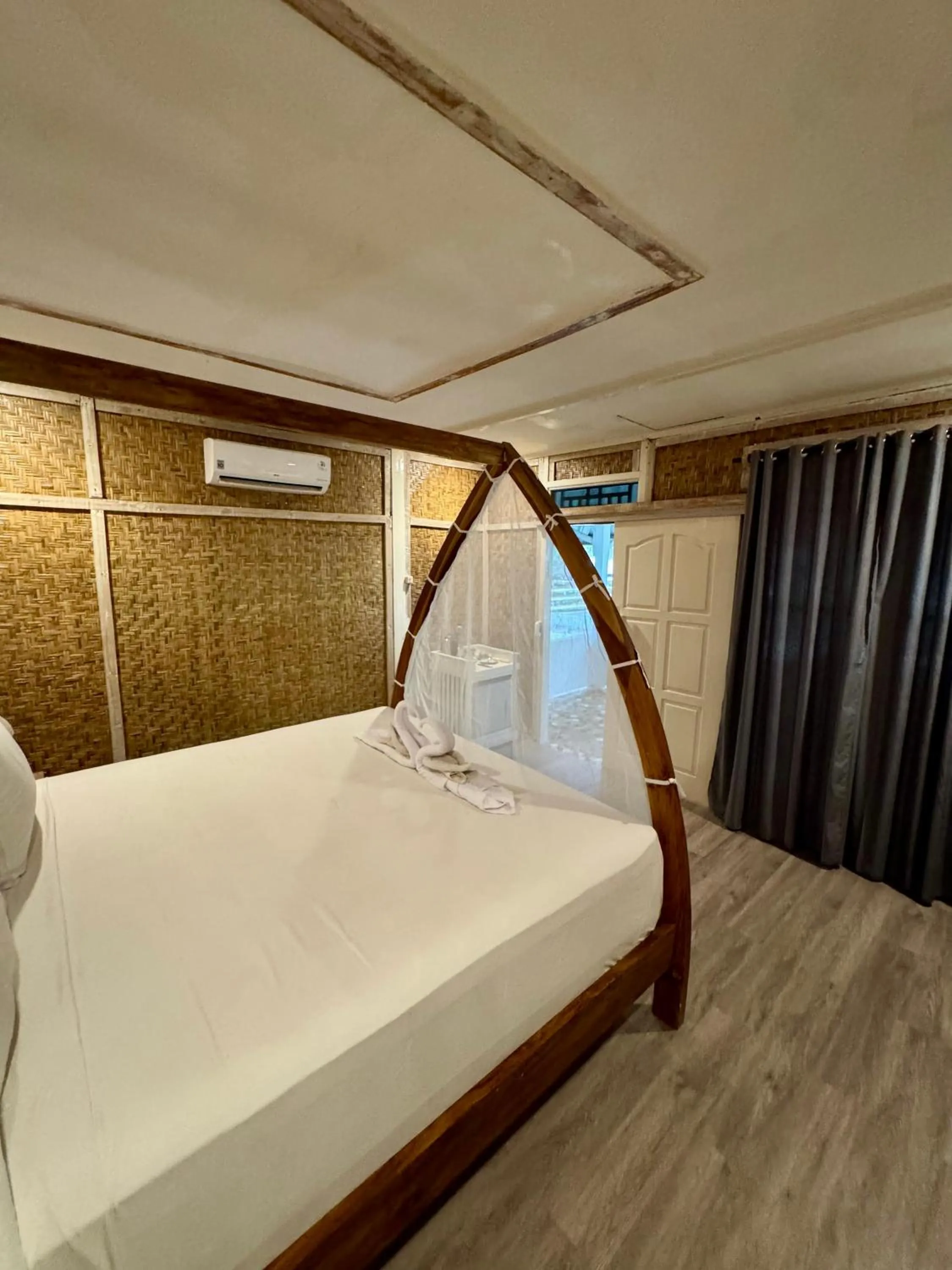 Bed in Pelangi Cottages Gili Air