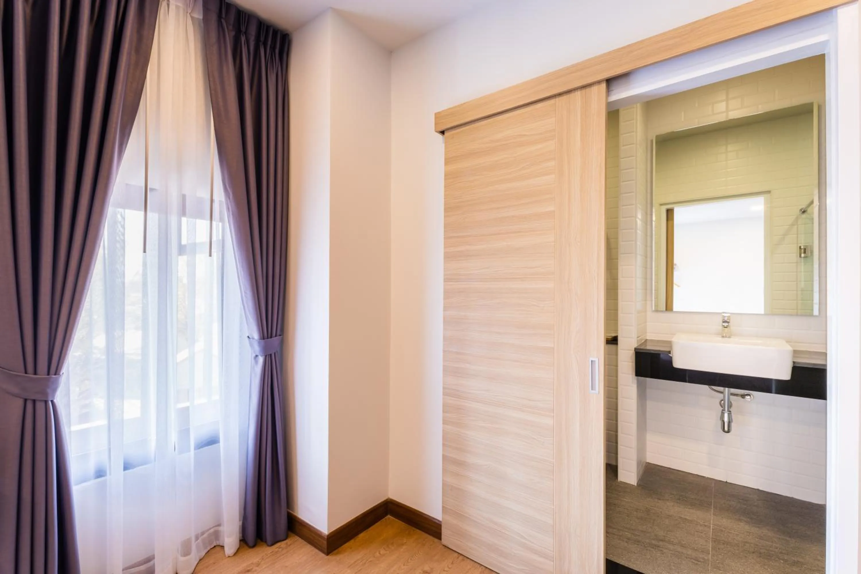 Bathroom in Icon Park Hotel, Chiang Mai- SHA Extra Plus