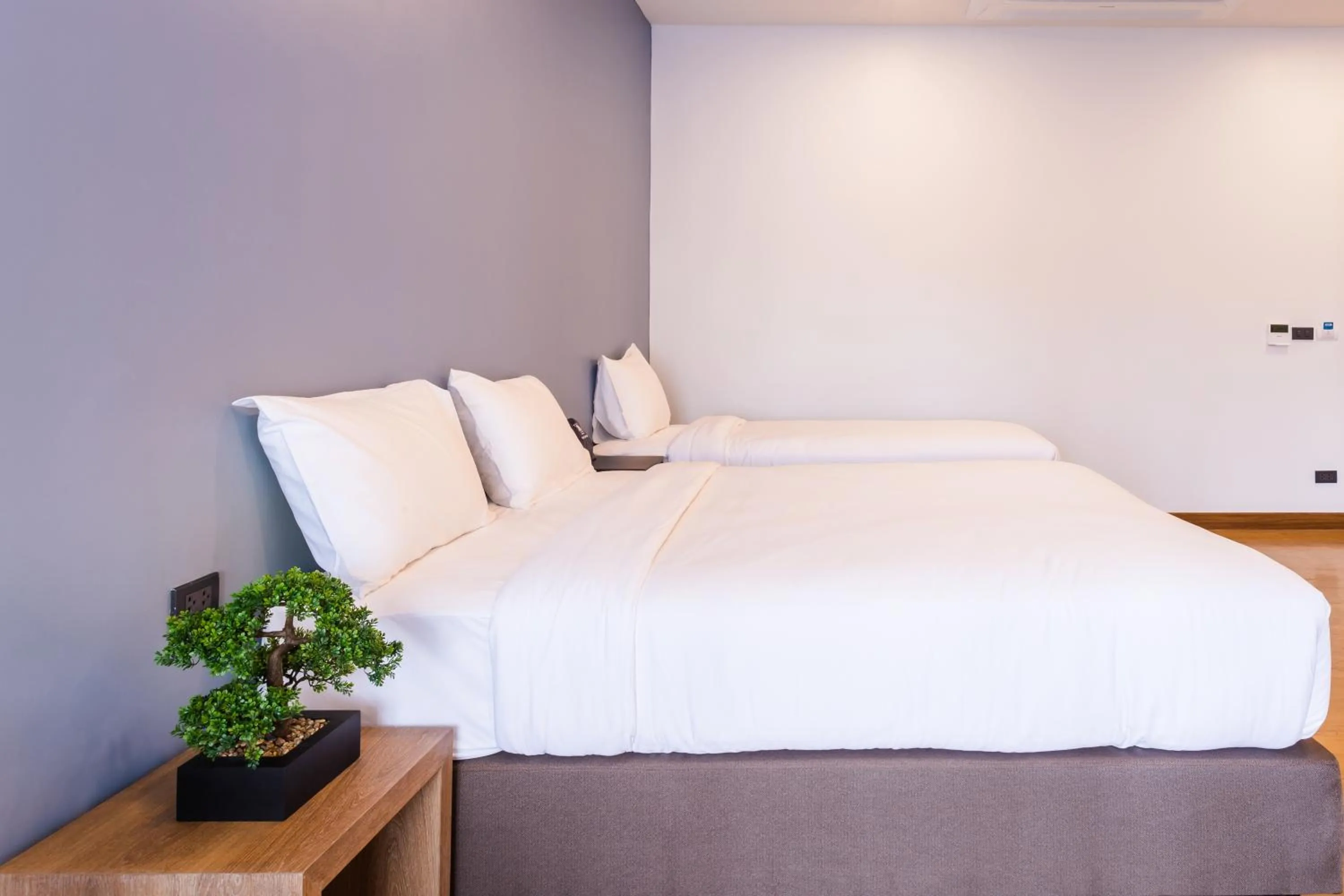 Bed in Icon Park Hotel, Chiang Mai- SHA Extra Plus