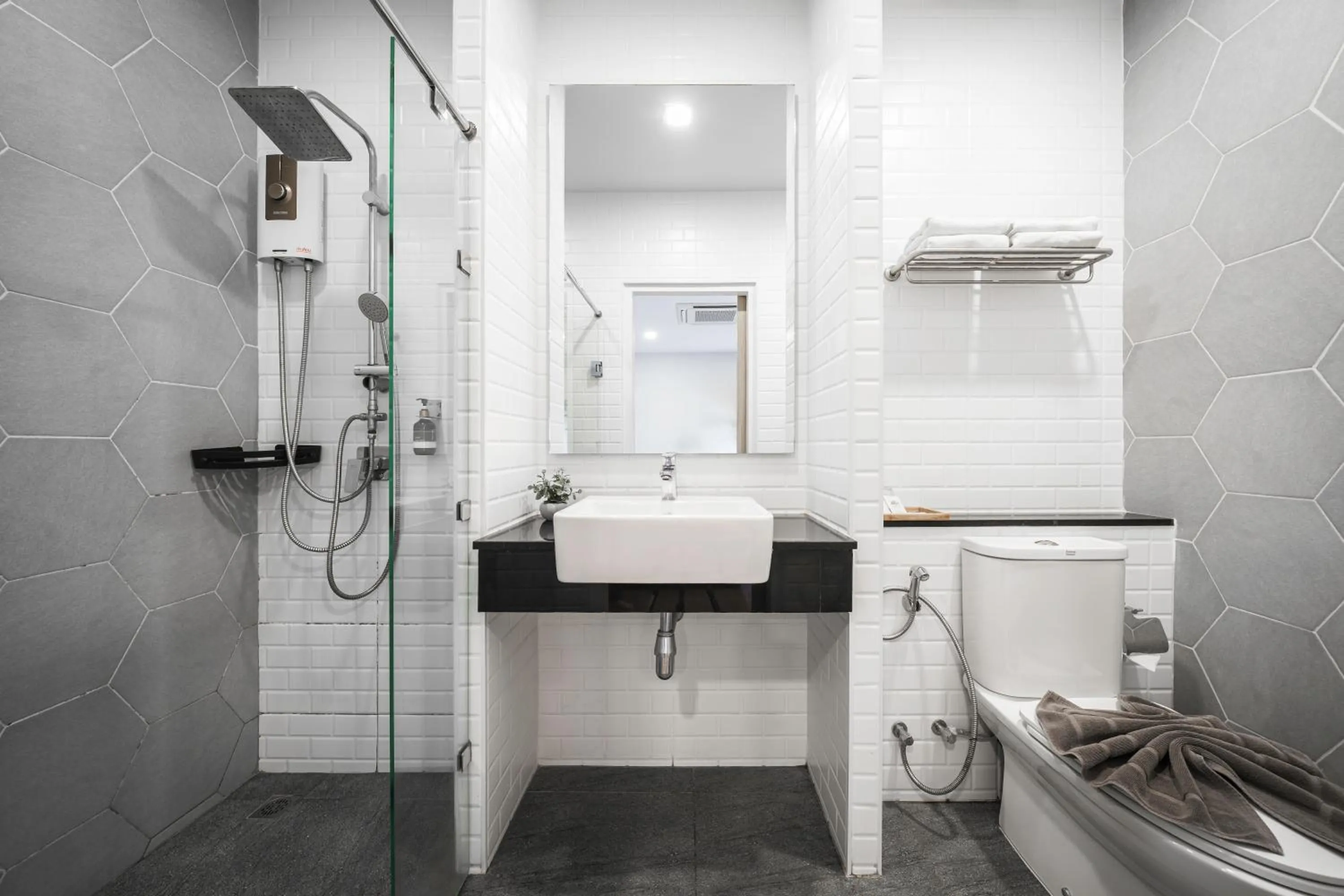 Shower in Icon Park Hotel, Chiang Mai- SHA Extra Plus