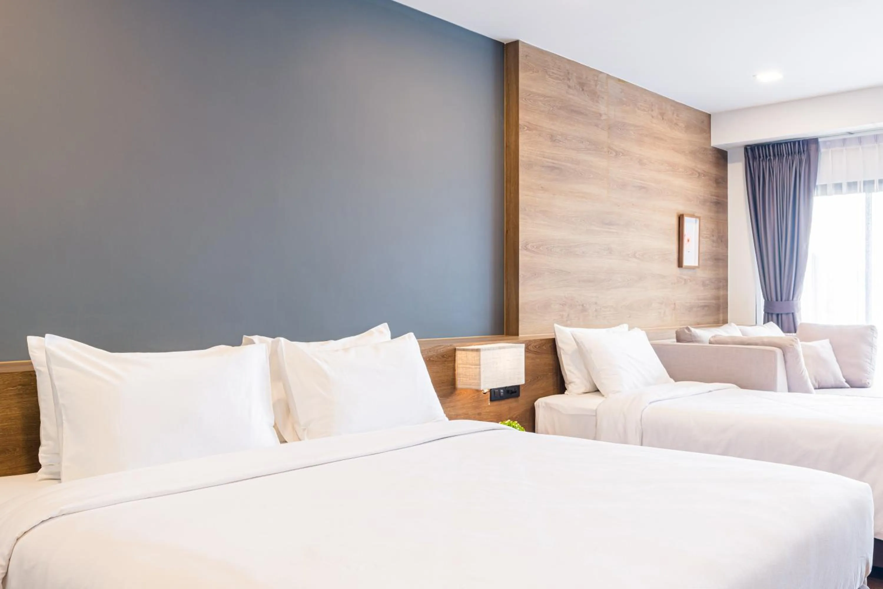 Bed in Icon Park Hotel, Chiang Mai- SHA Extra Plus