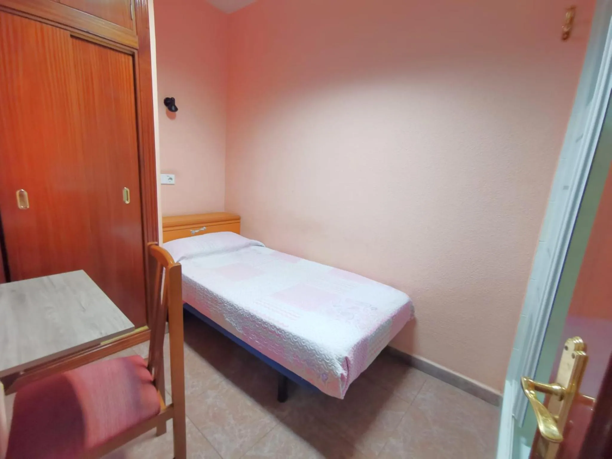 Photo of the whole room, Bed in Casa de Huespedes La Asturiana