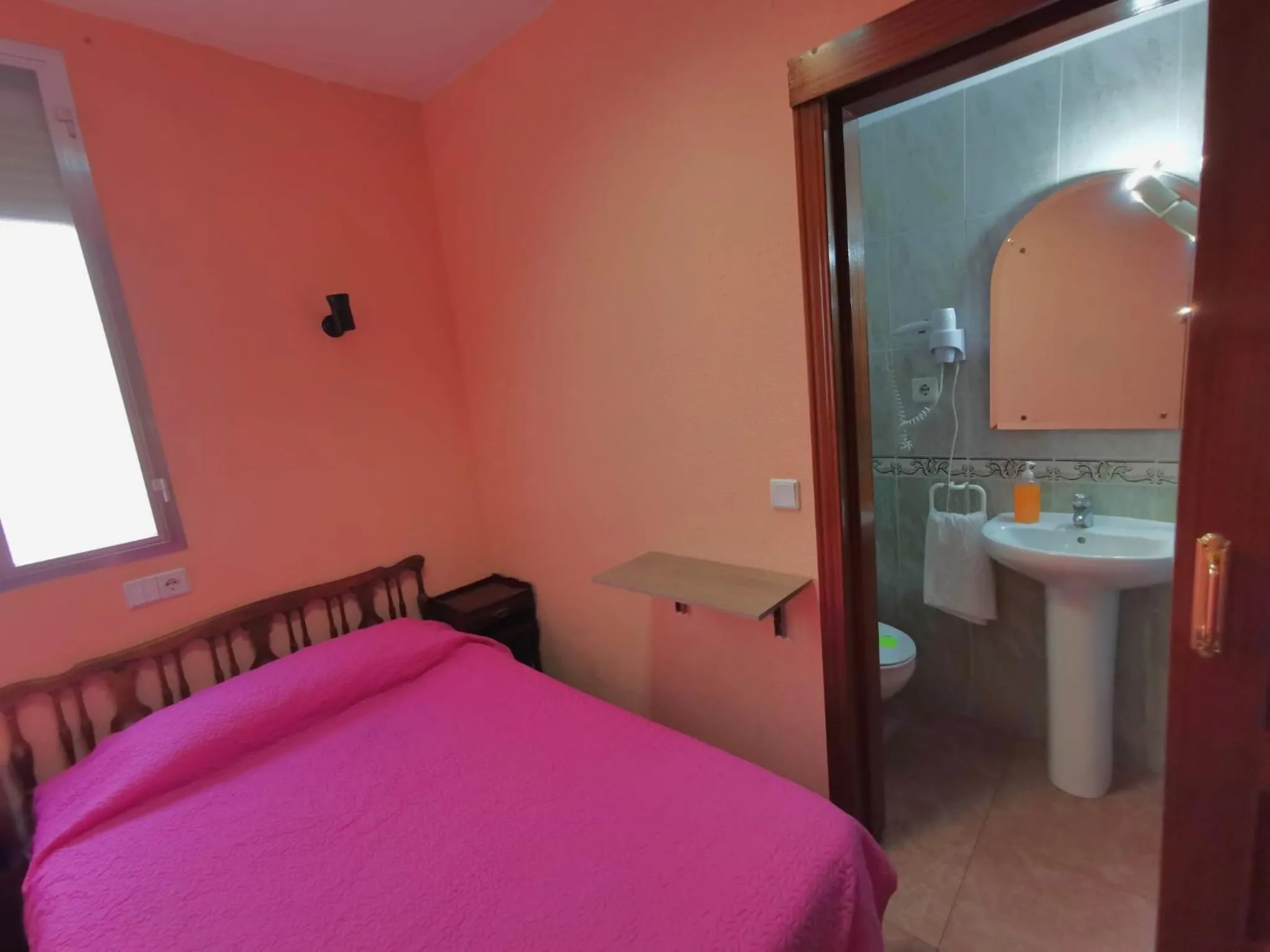 Photo of the whole room, Bed in Casa de Huespedes La Asturiana