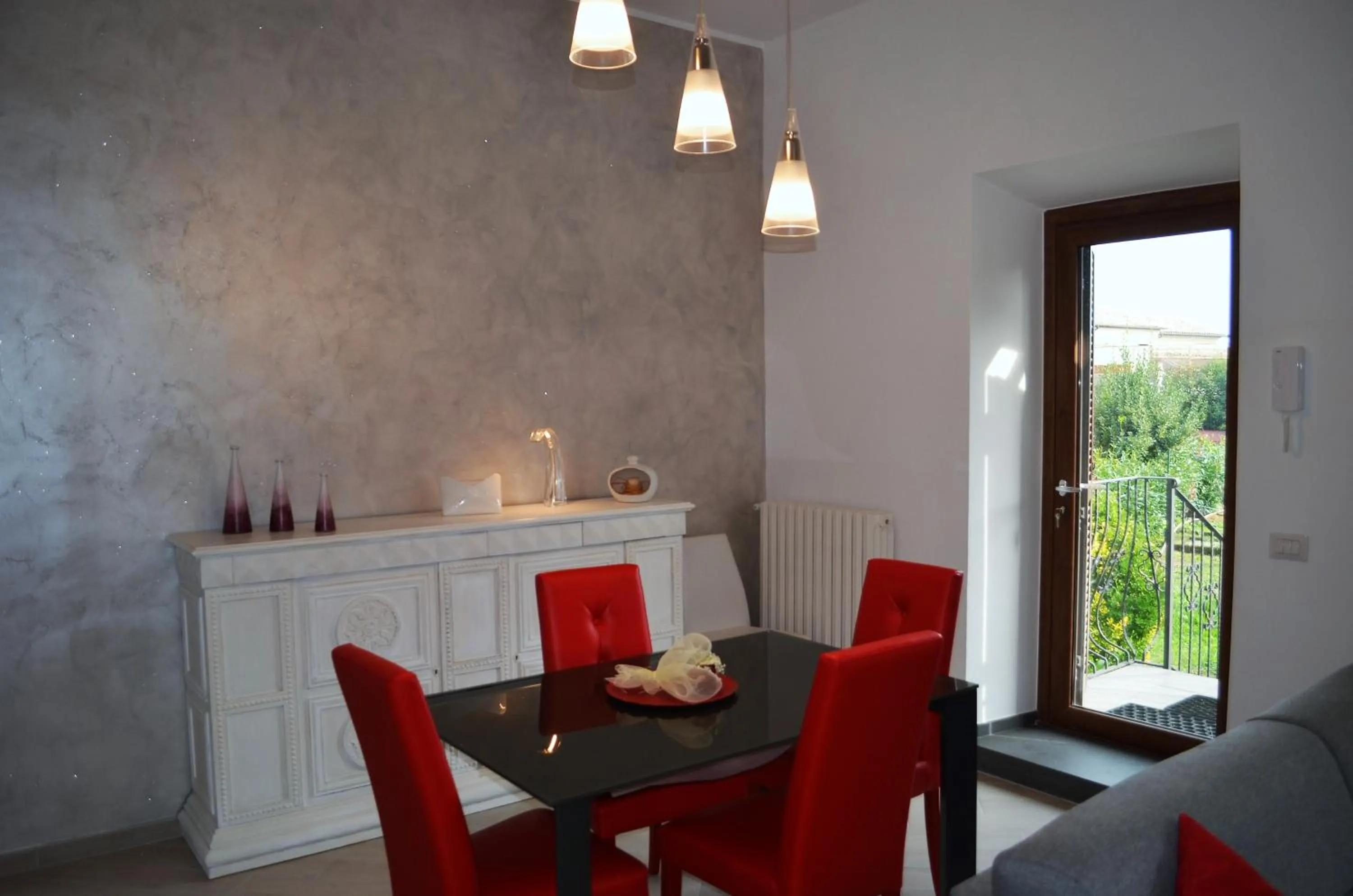 Communal lounge/ TV room in Il giardino di Elena