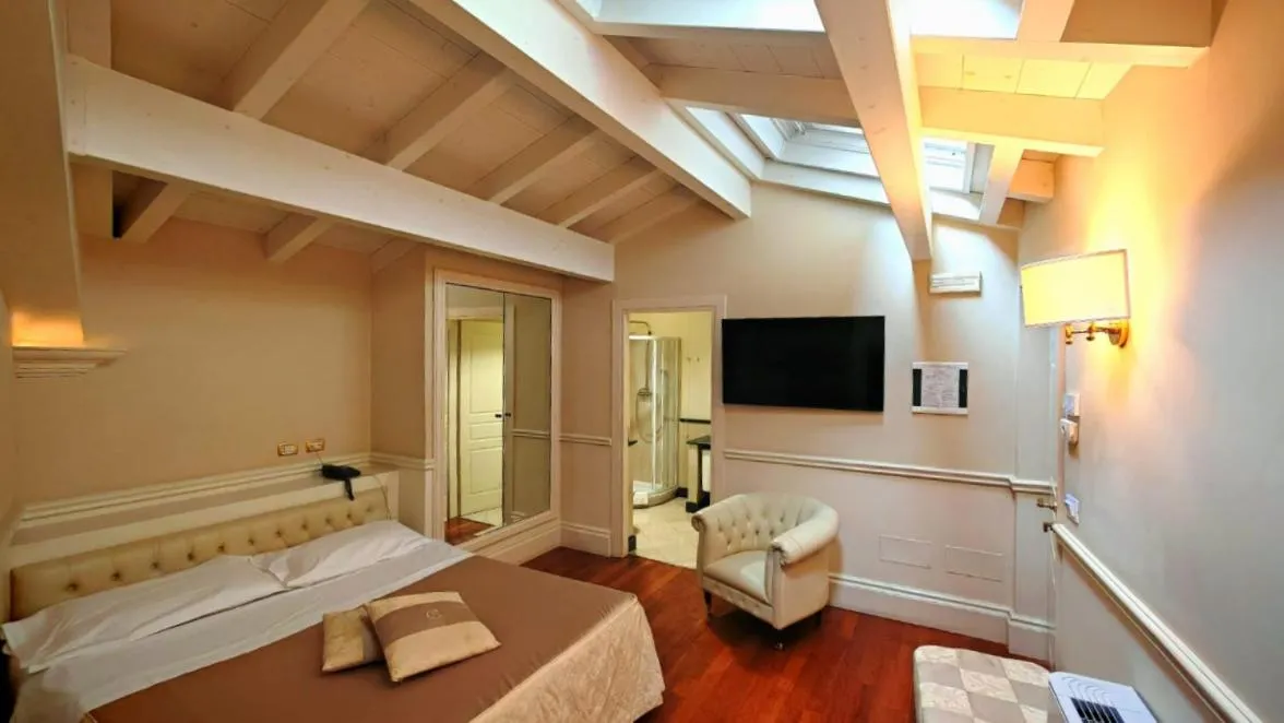 Bed in Suite Hotel Santa Chiara