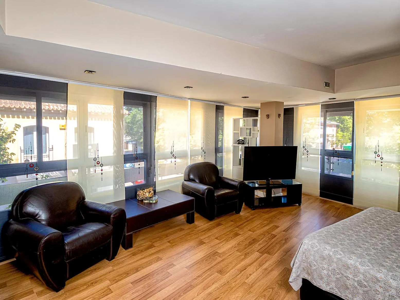 Communal lounge/ TV room, Bed in Hostal Real Aranjuez