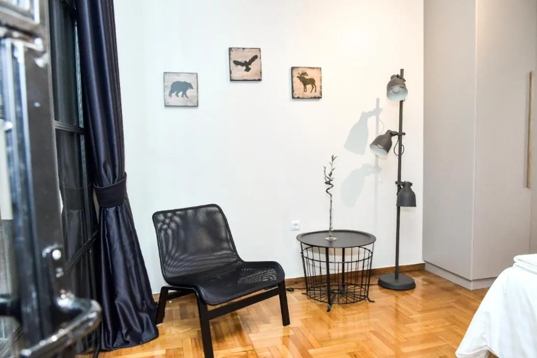 Seating area in Central apartment at Echarxia 2 beds for 5 pers by MPS