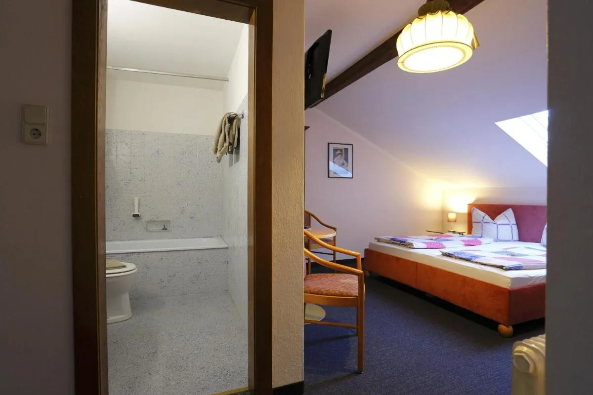 Bathroom, Bed in Alpen.Adria.Stadthotel