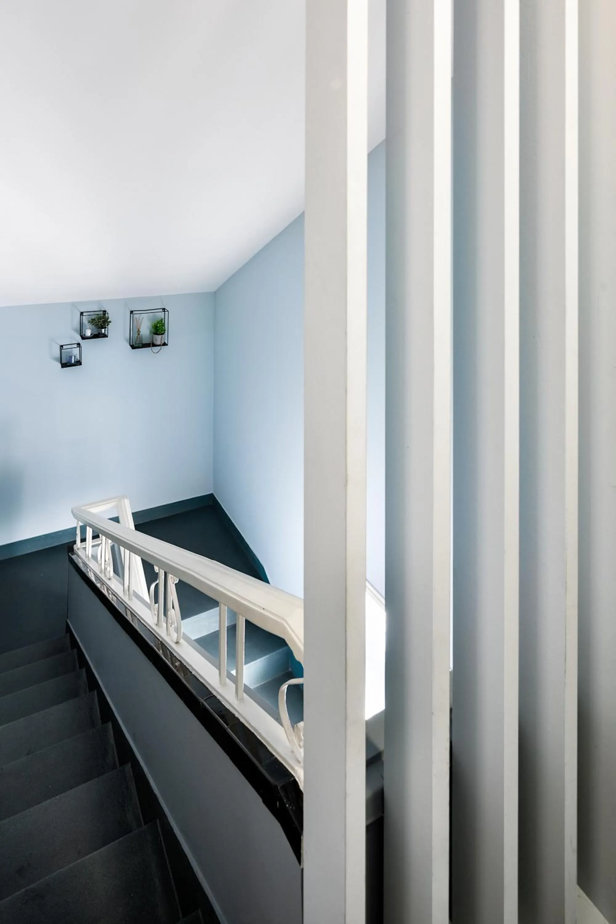 Property building, Bed in JR Studios & Suites I Rius I