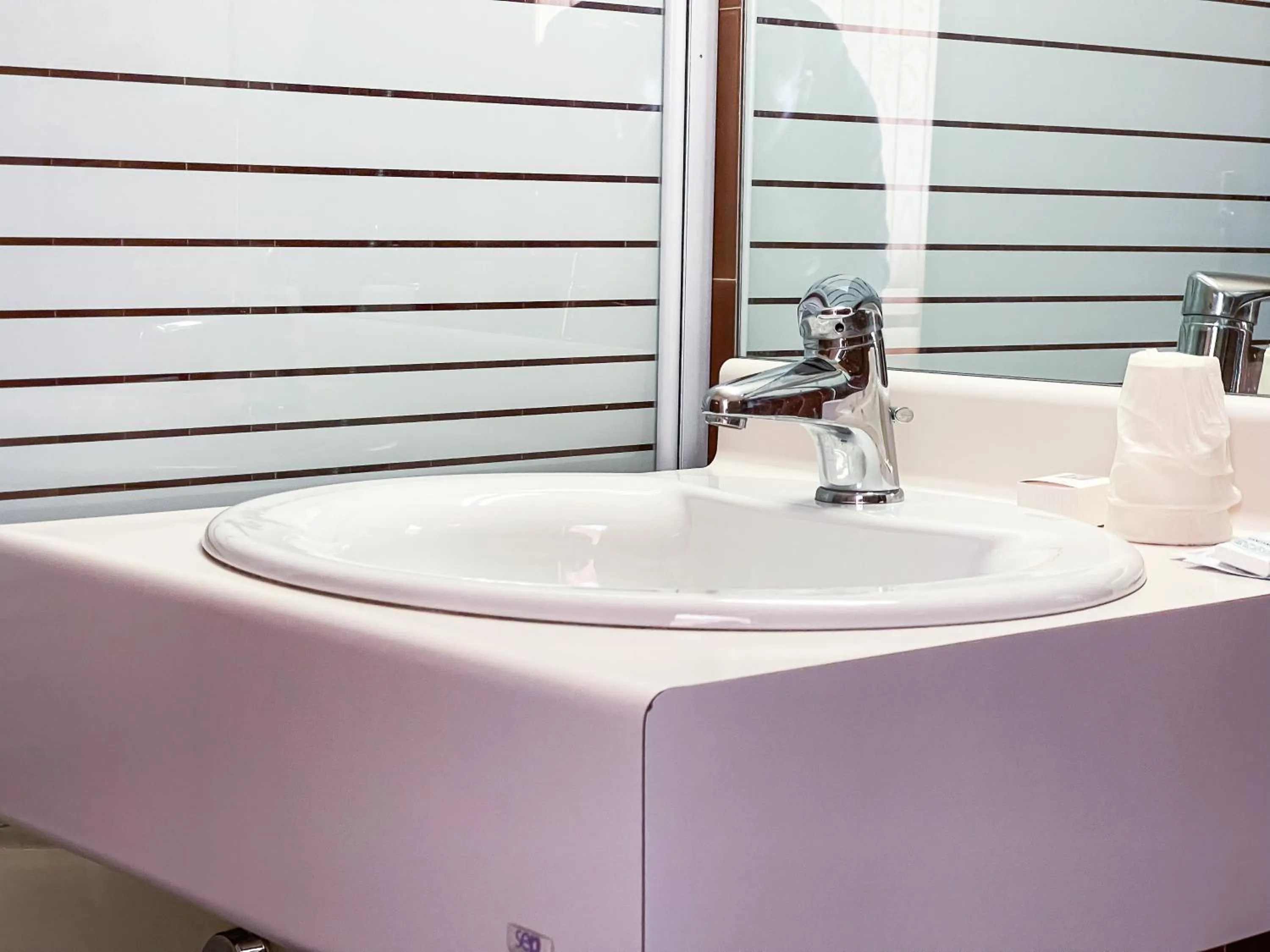 Bathroom in Atmosphere Hotel