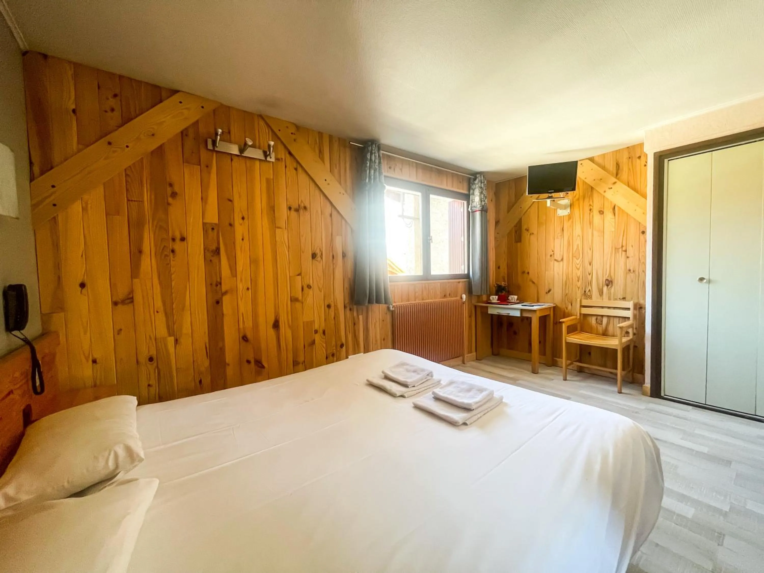 Bed in Atmosphere Hotel