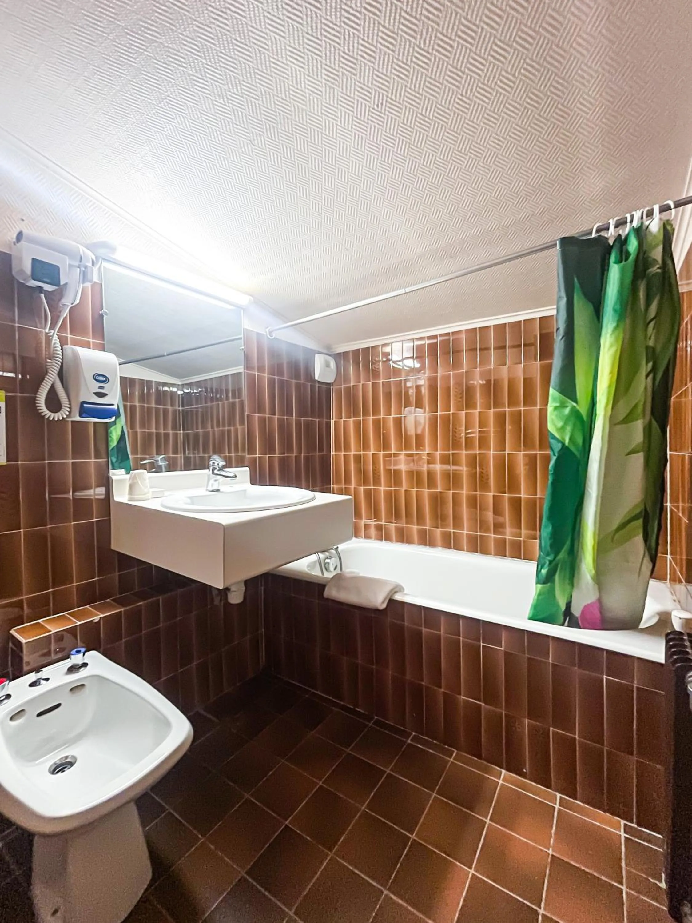 Bathroom in Atmosphere Hotel