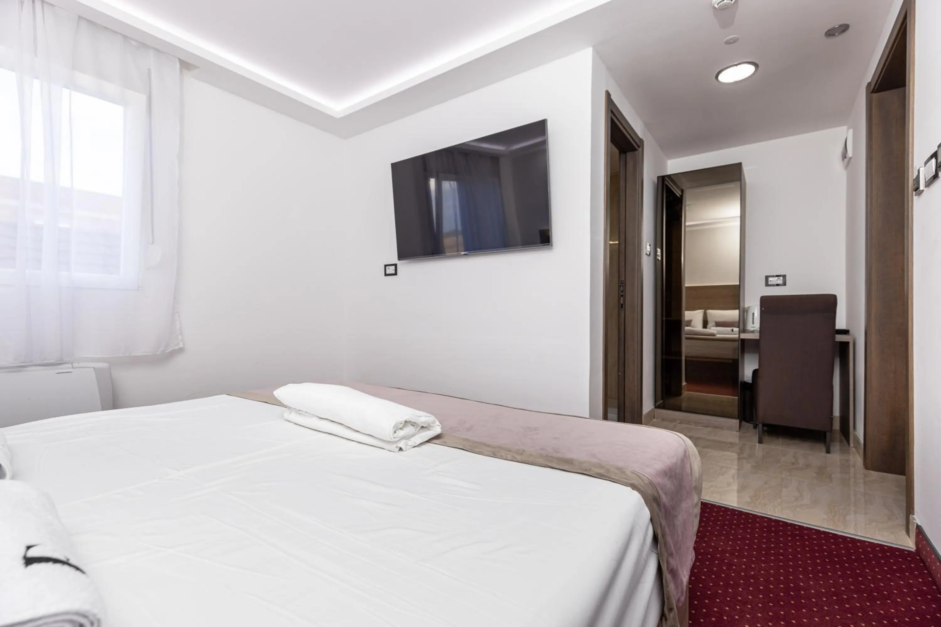 Bed in ForS Resort & Spa