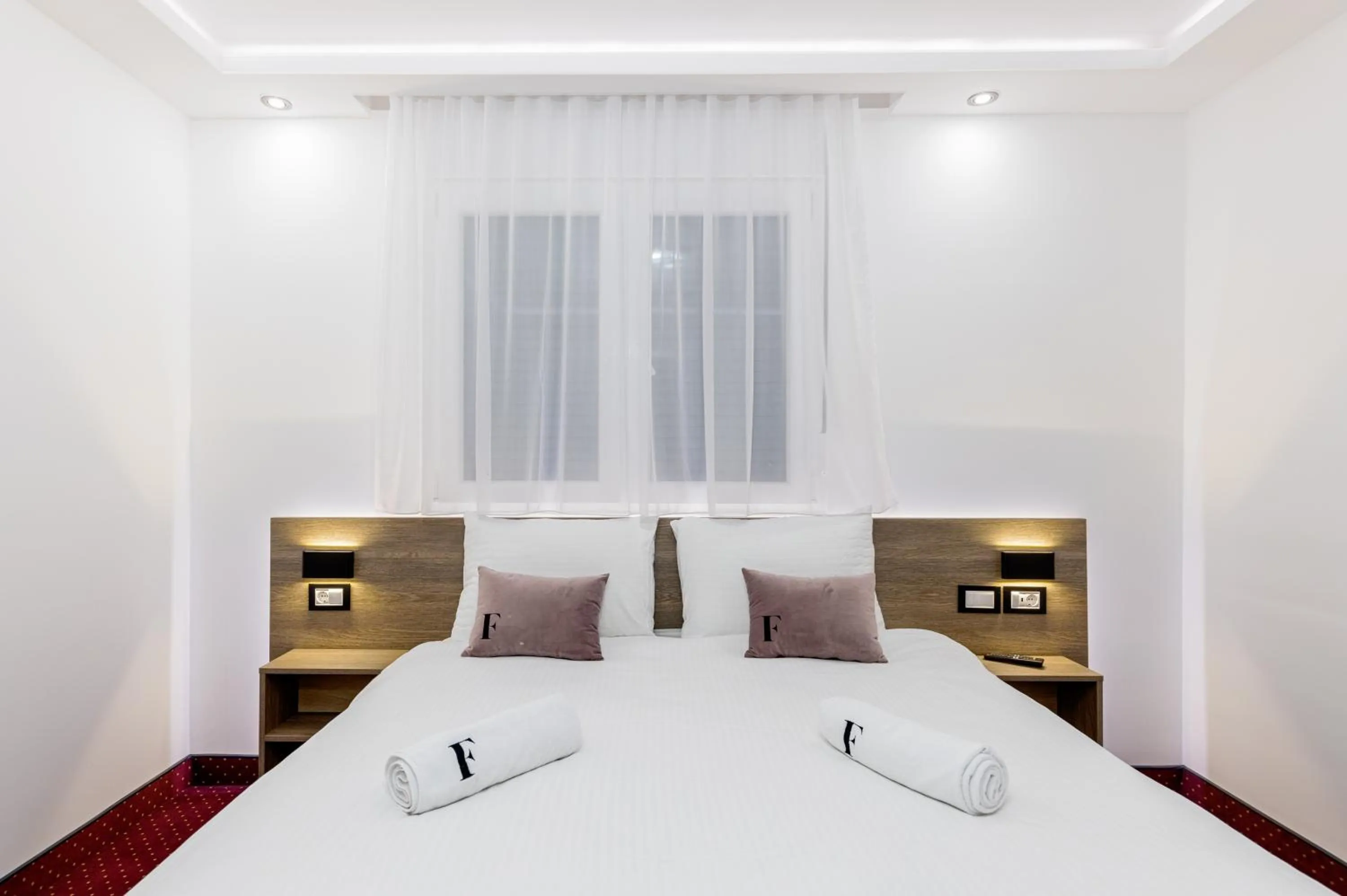 Bed in ForS Resort & Spa