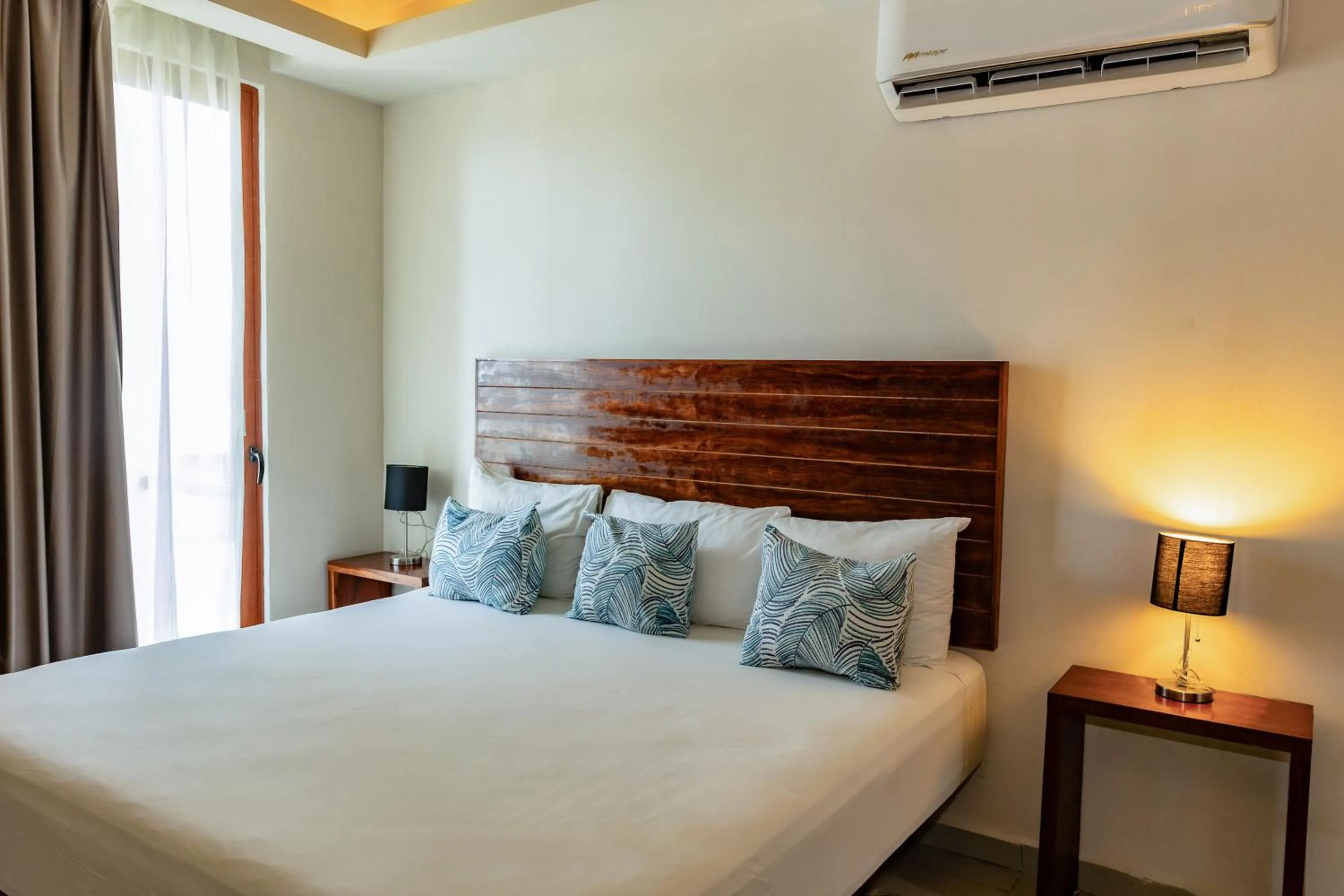 Bed in Aquastar Unique Hotel & Apartments Mahahual