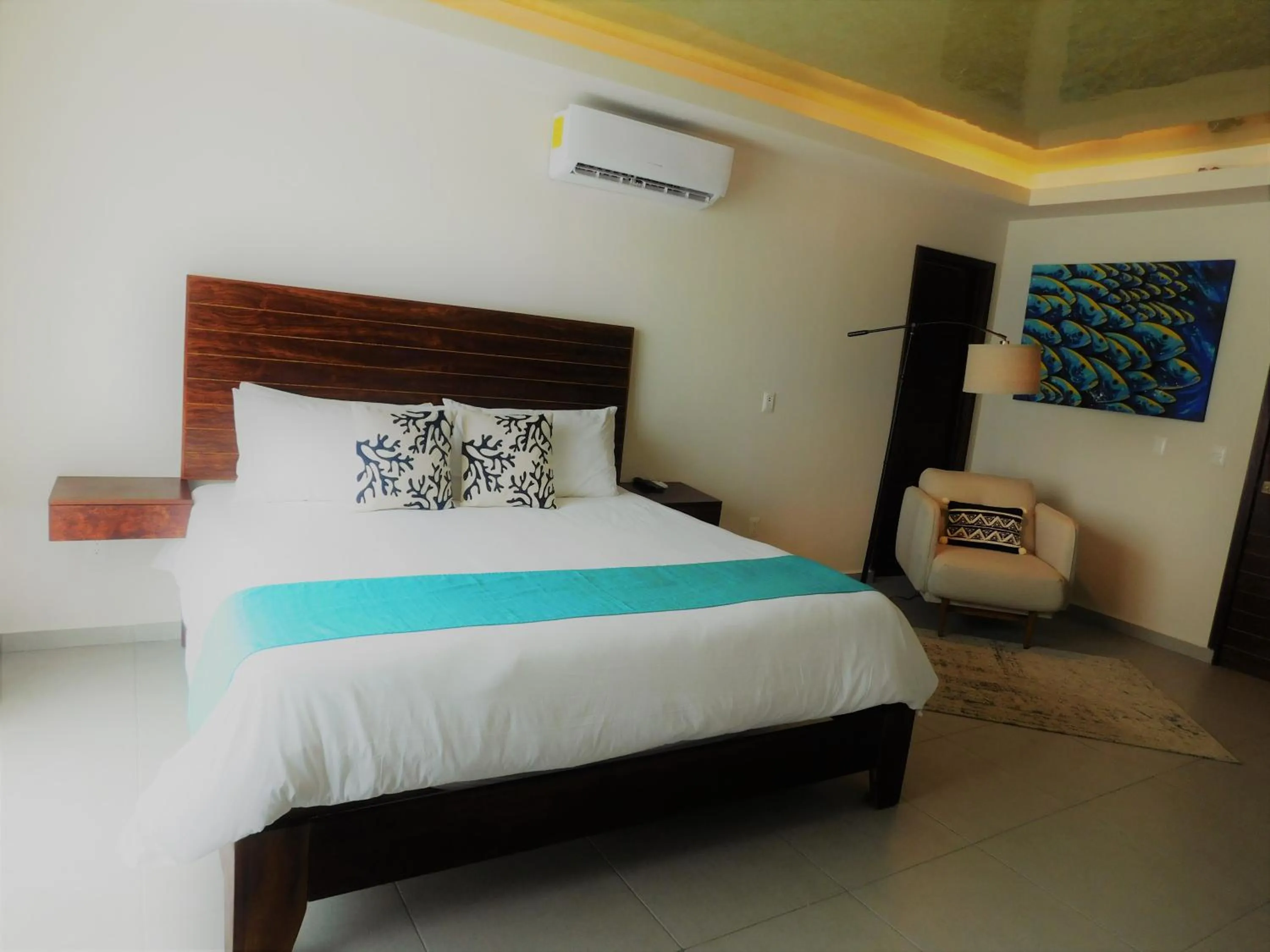 Bed in Aquastar Unique Hotel & Apartments Mahahual