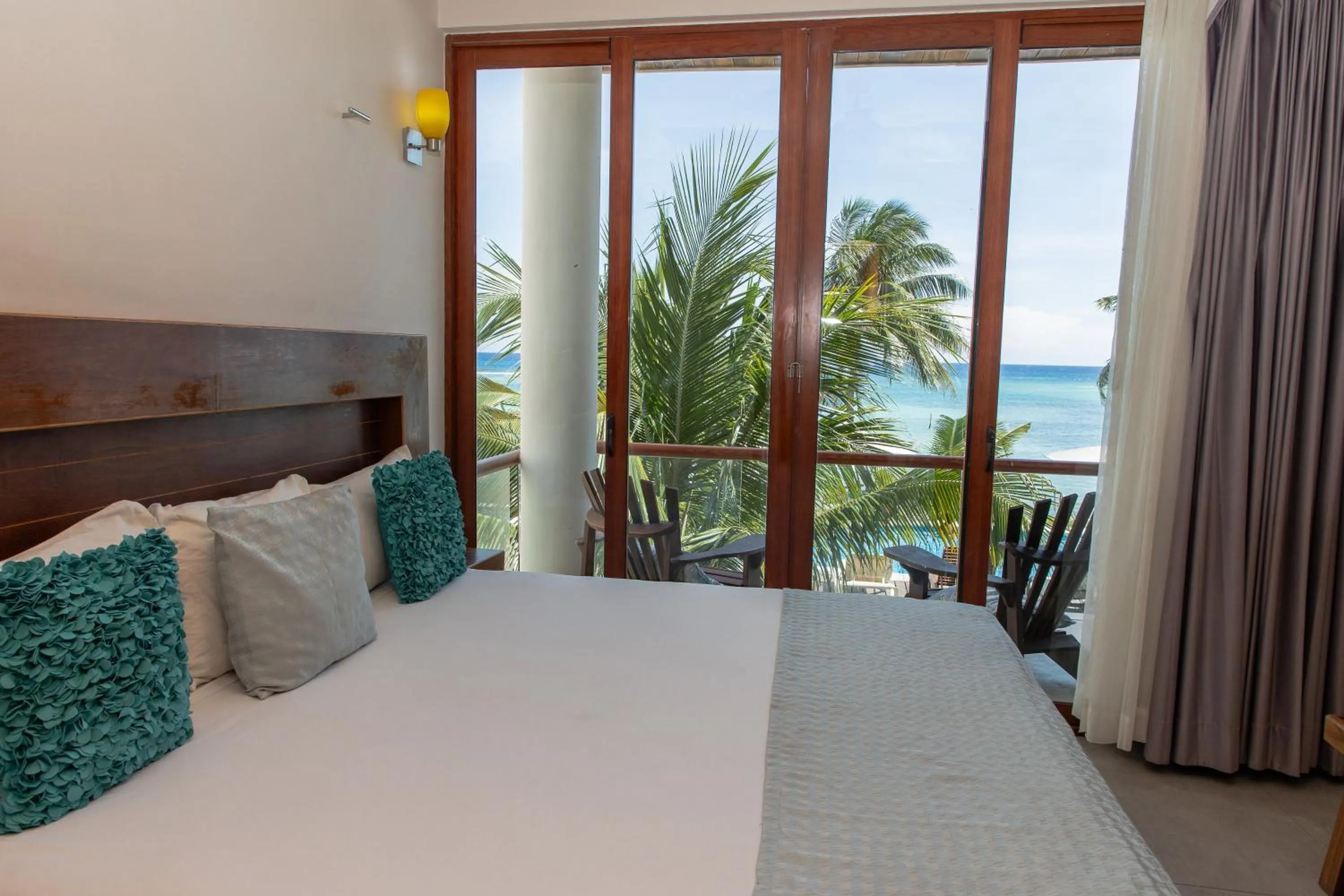 Bed in Aquastar Unique Hotel & Apartments Mahahual