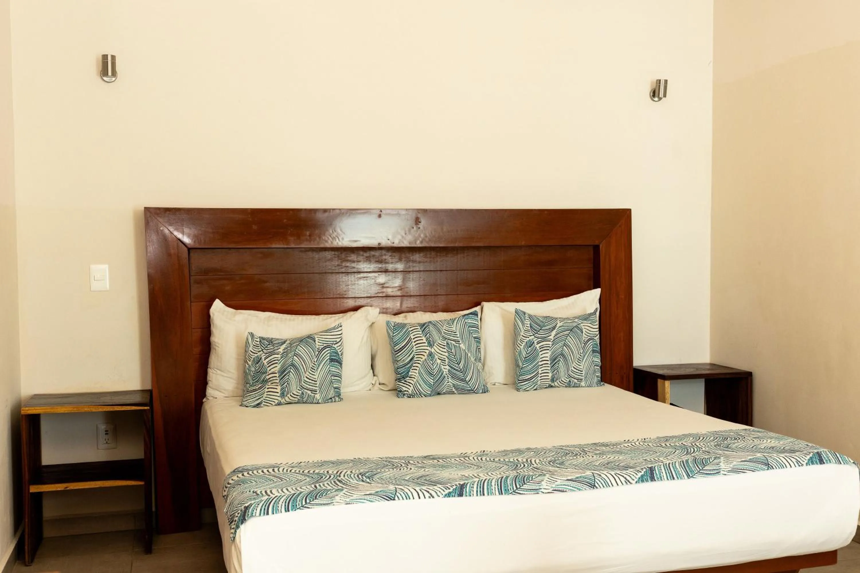 Bed in Aquastar Unique Hotel & Apartments Mahahual