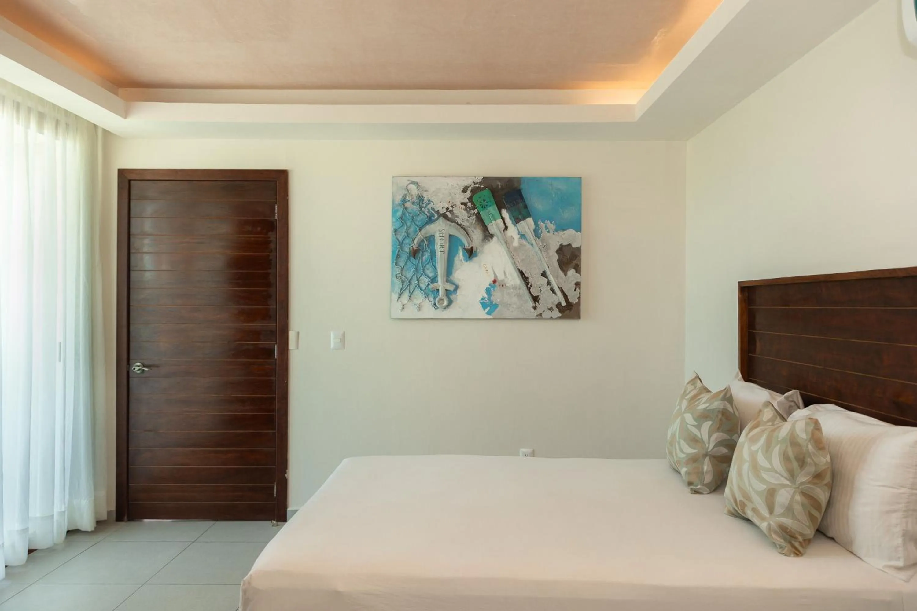 Bed in Aquastar Unique Hotel & Apartments Mahahual