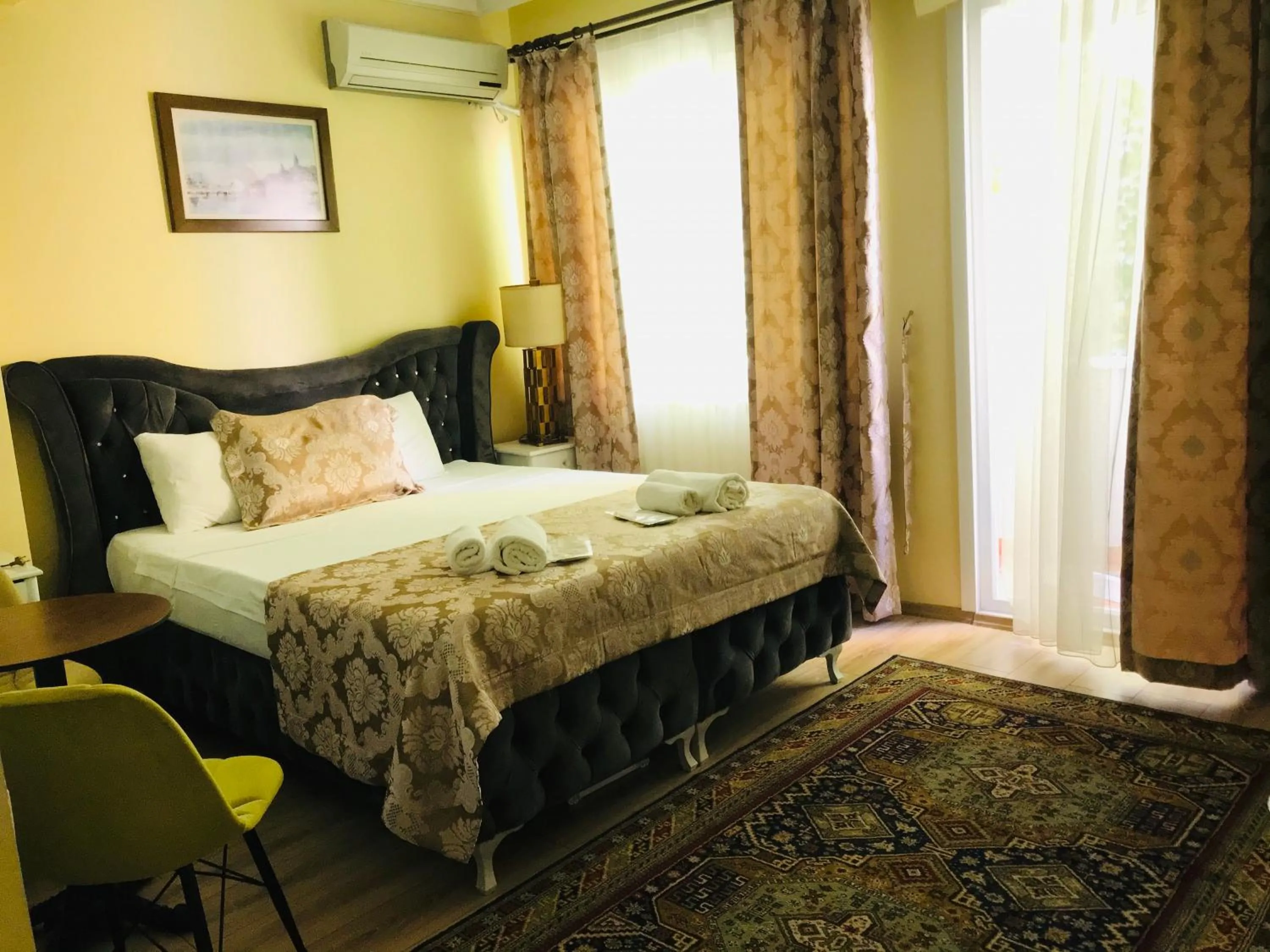 Photo of the whole room in La Mer Boutique Hotel