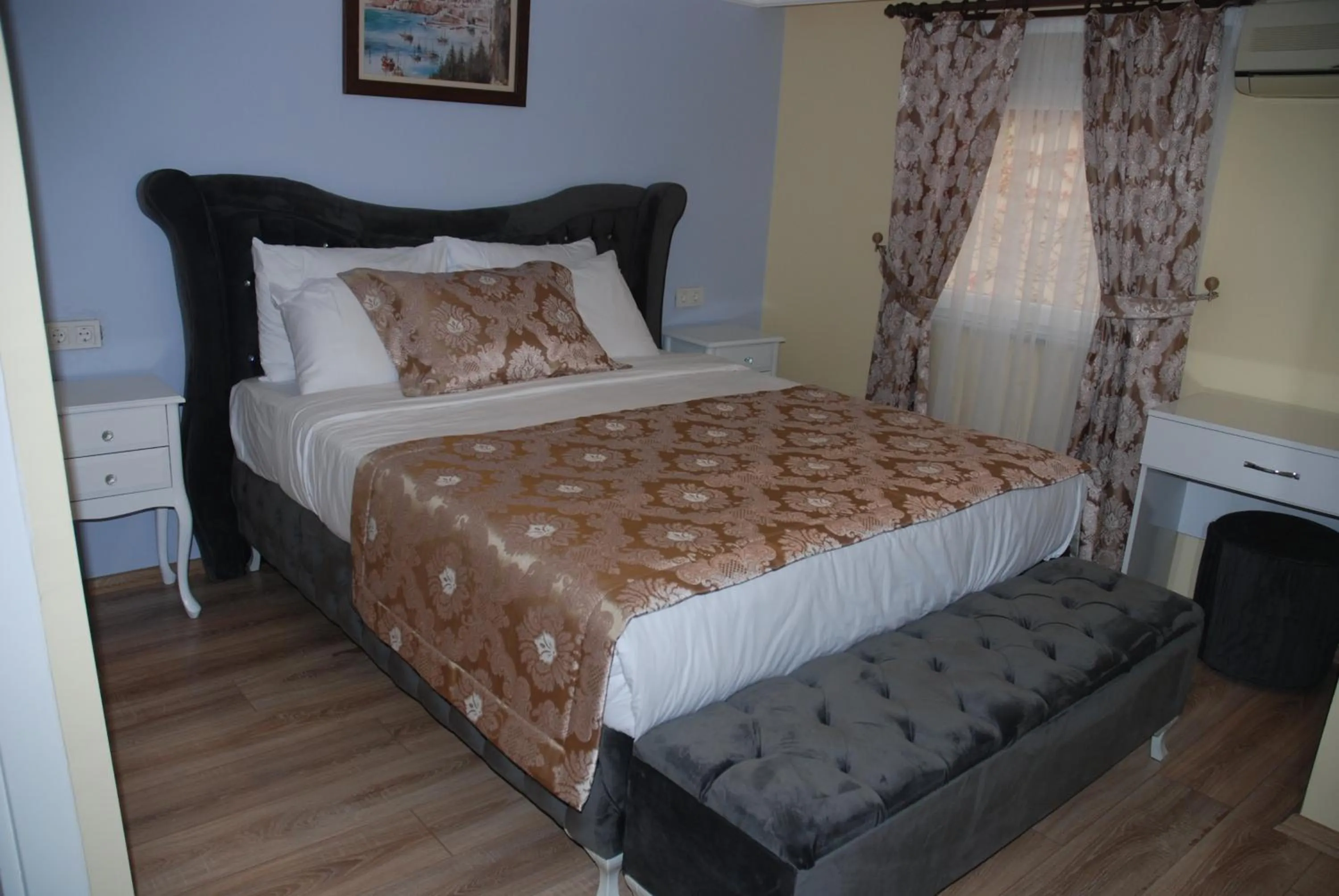 Bed in La Mer Boutique Hotel