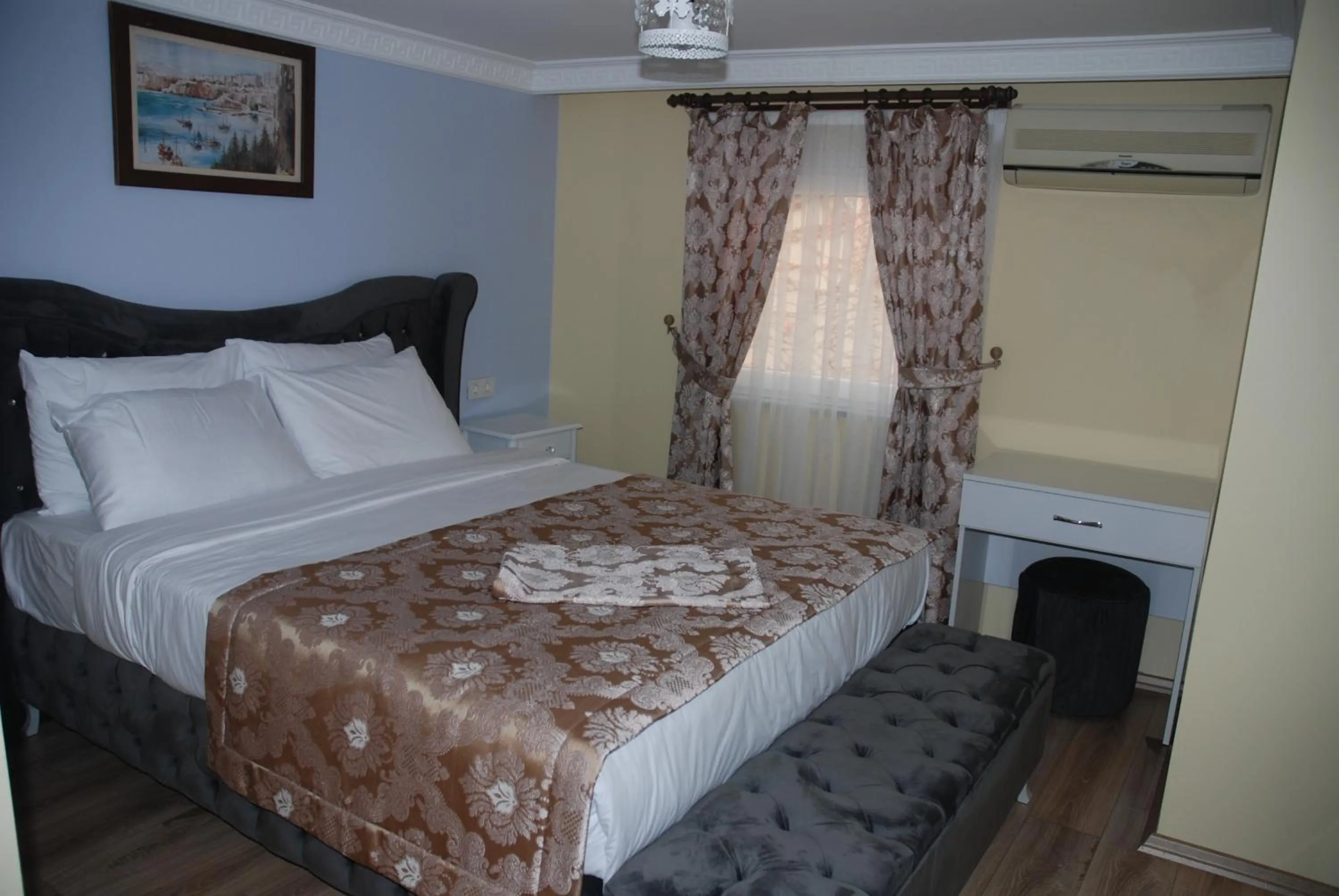 Bed in La Mer Boutique Hotel