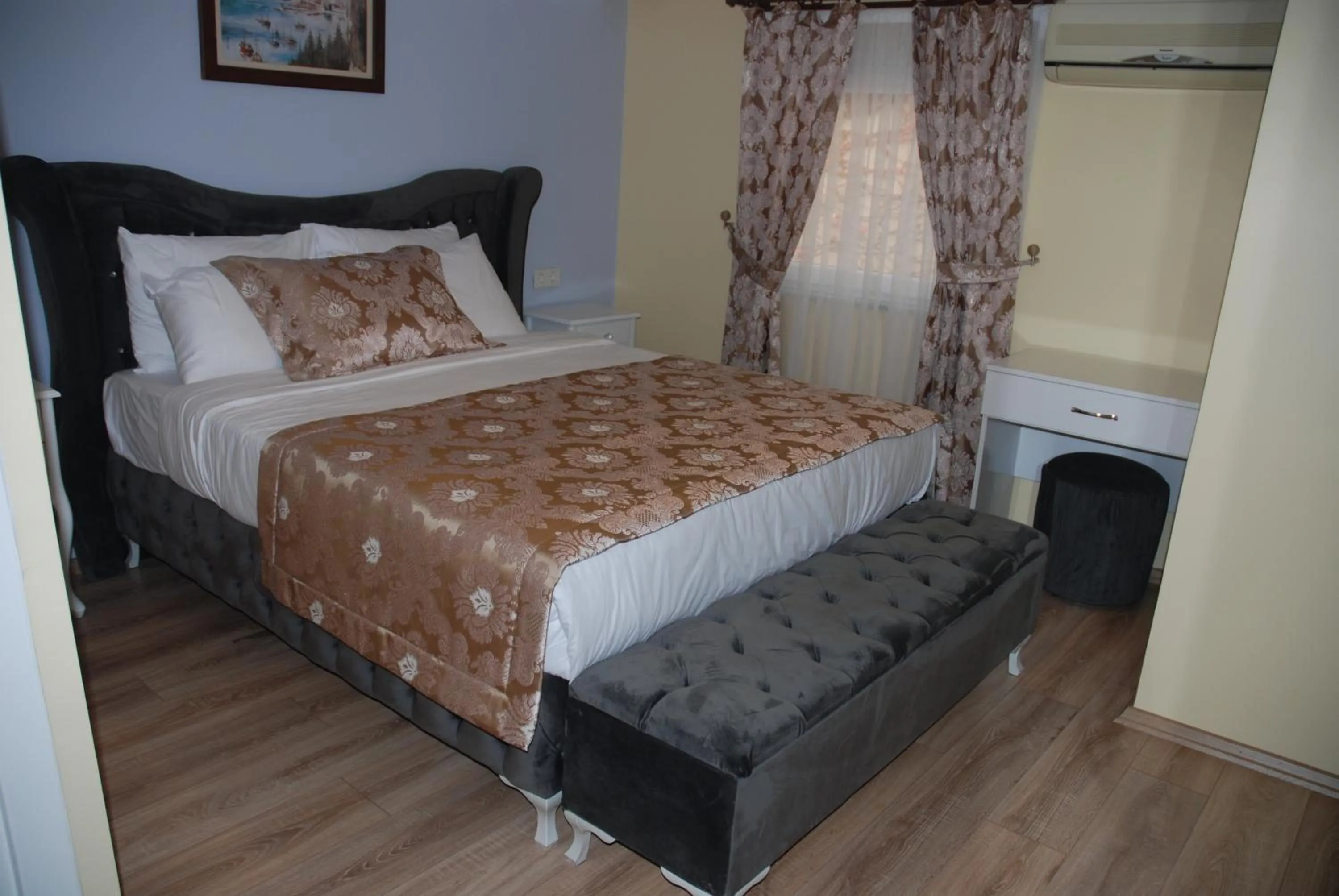 Bed in La Mer Boutique Hotel