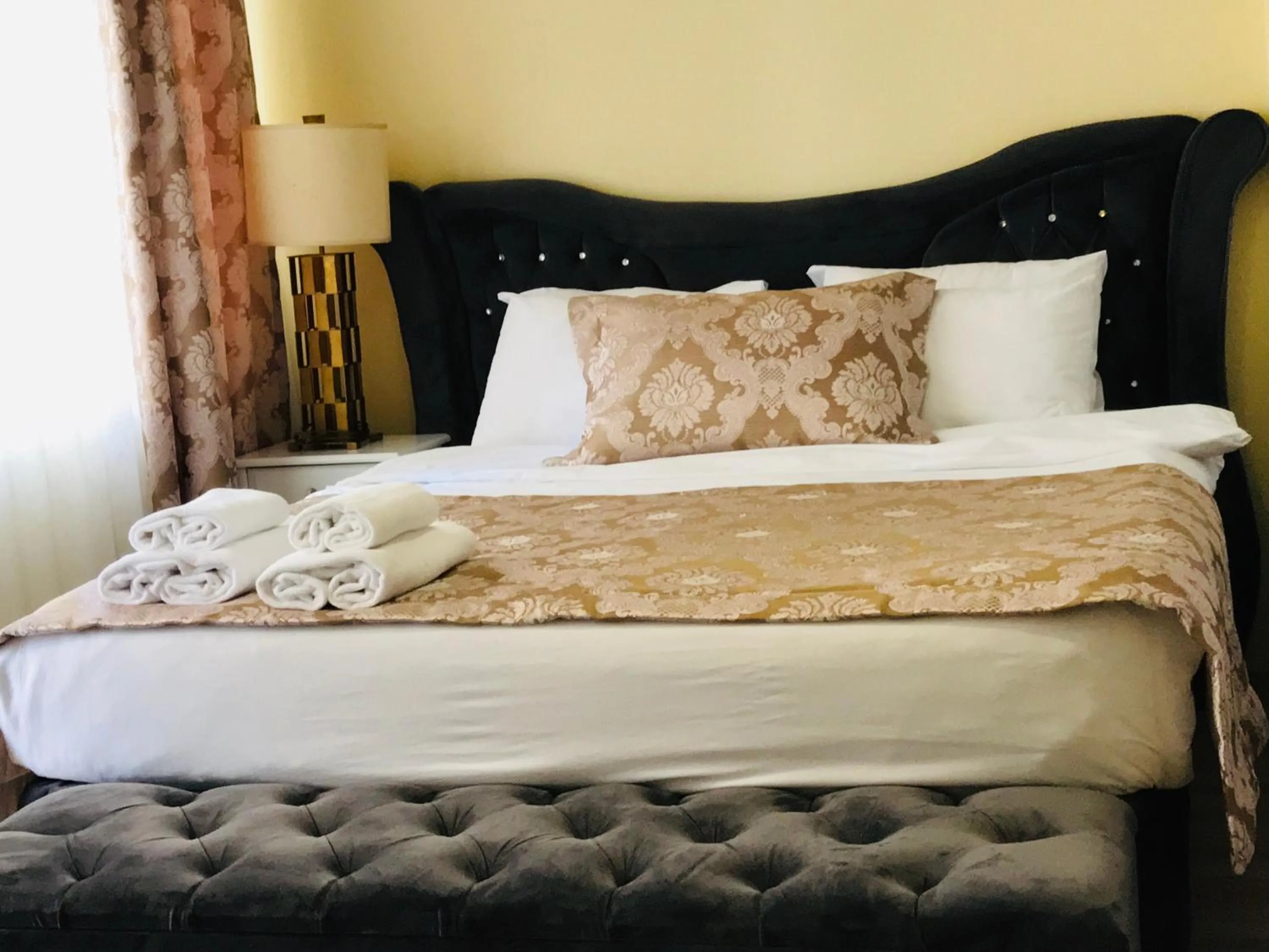 Bed in La Mer Boutique Hotel