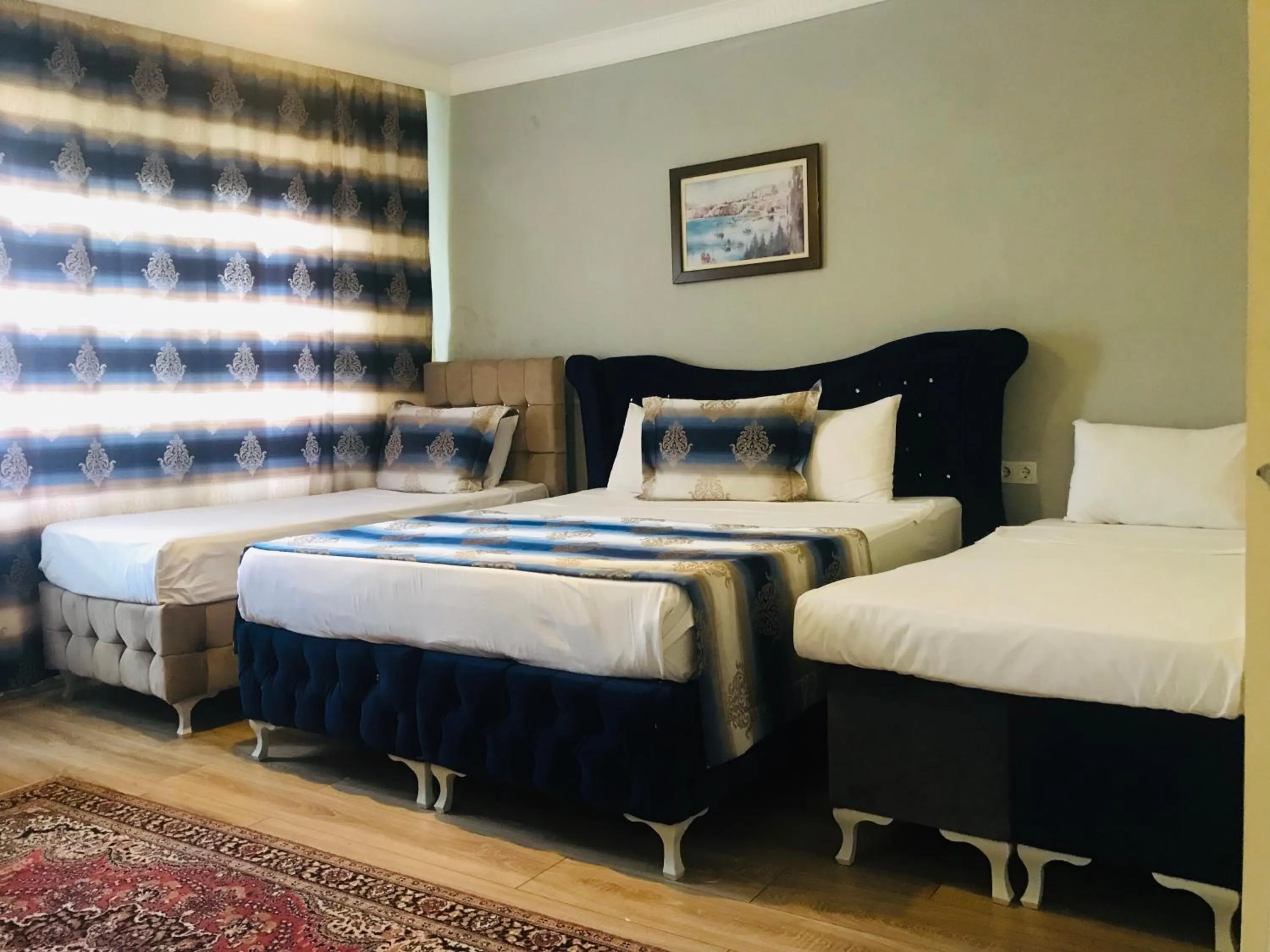 Bed in La Mer Boutique Hotel