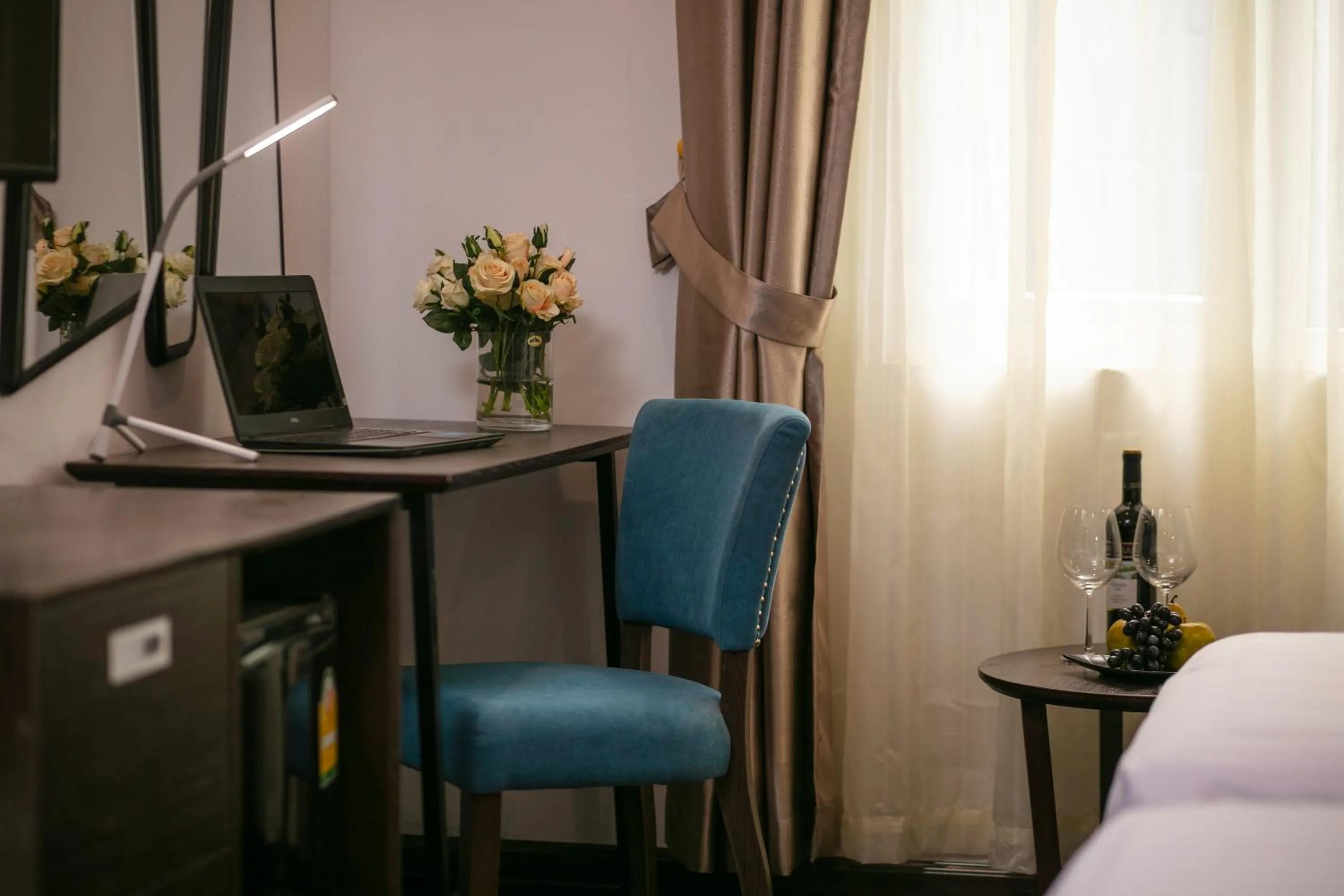 Seating area, Bed in Azalea Parkview Hotel