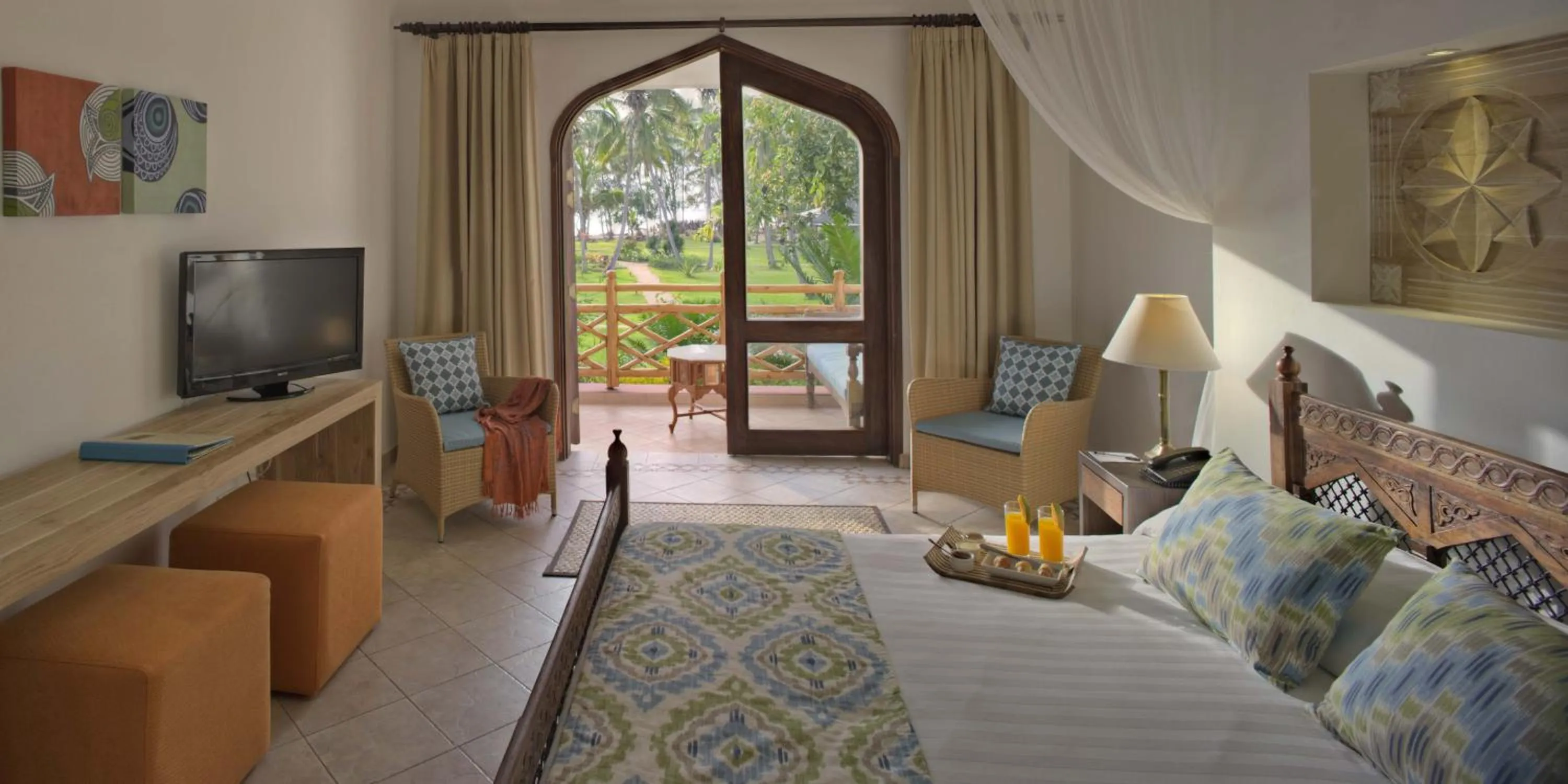 Photo of the whole room, Bed in Bluebay Beach Resort & Spa