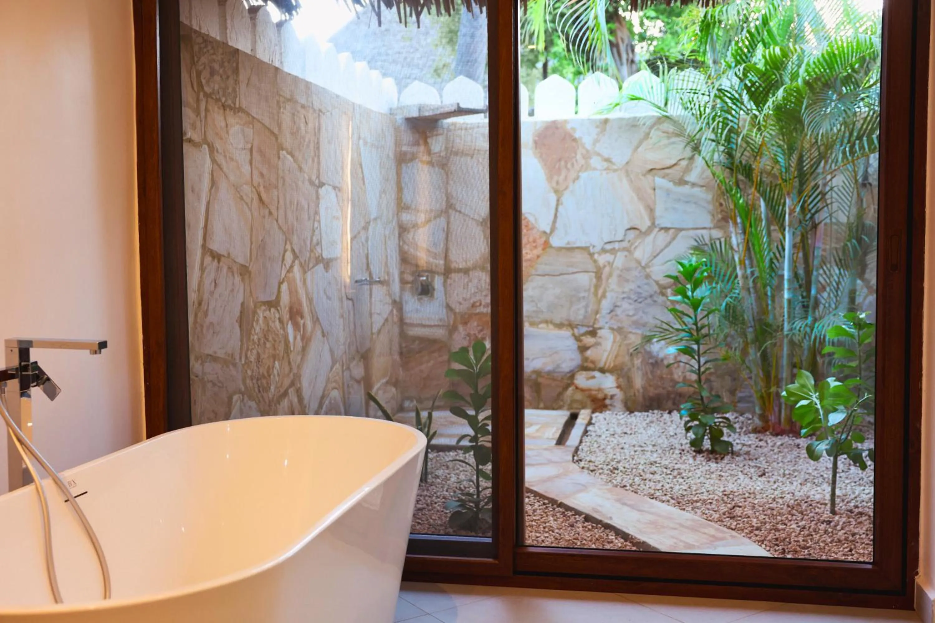 Shower in Bluebay Beach Resort & Spa