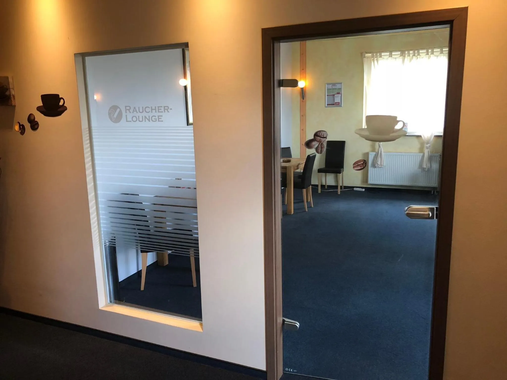 Communal lounge/ TV room in Schleswig Holstein Hotel