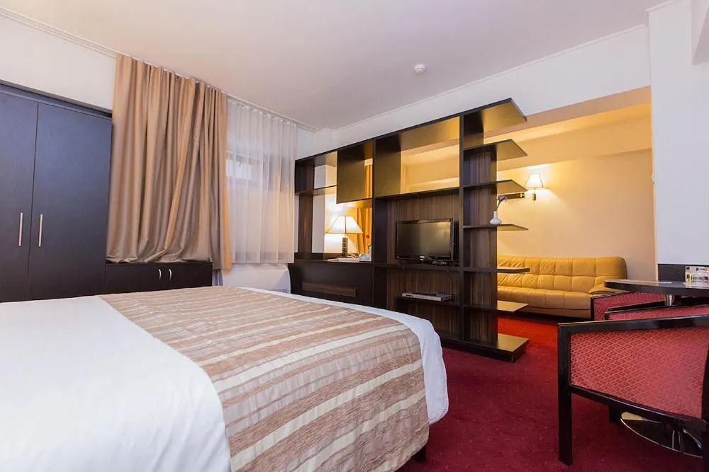 Photo of the whole room, Bed in Ramada Iasi City Center