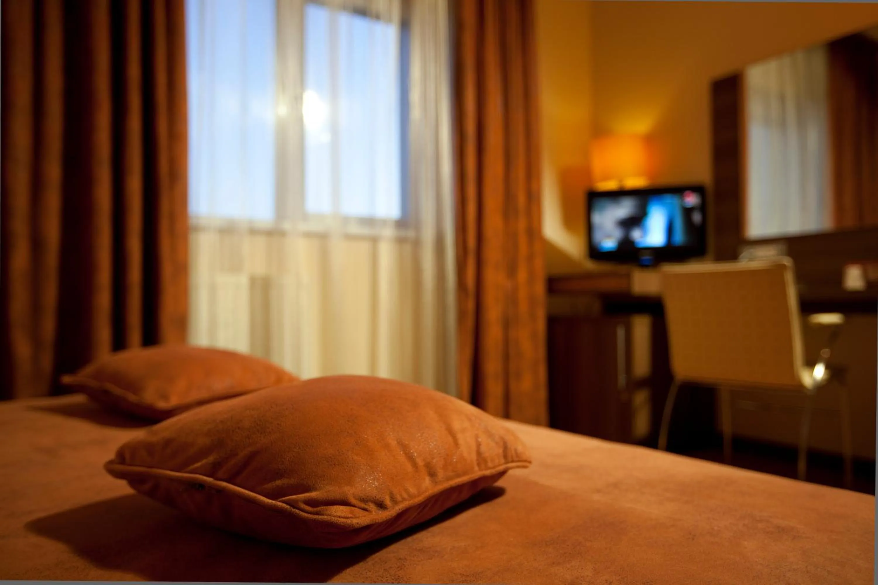 Bed in RIN Central Hotel