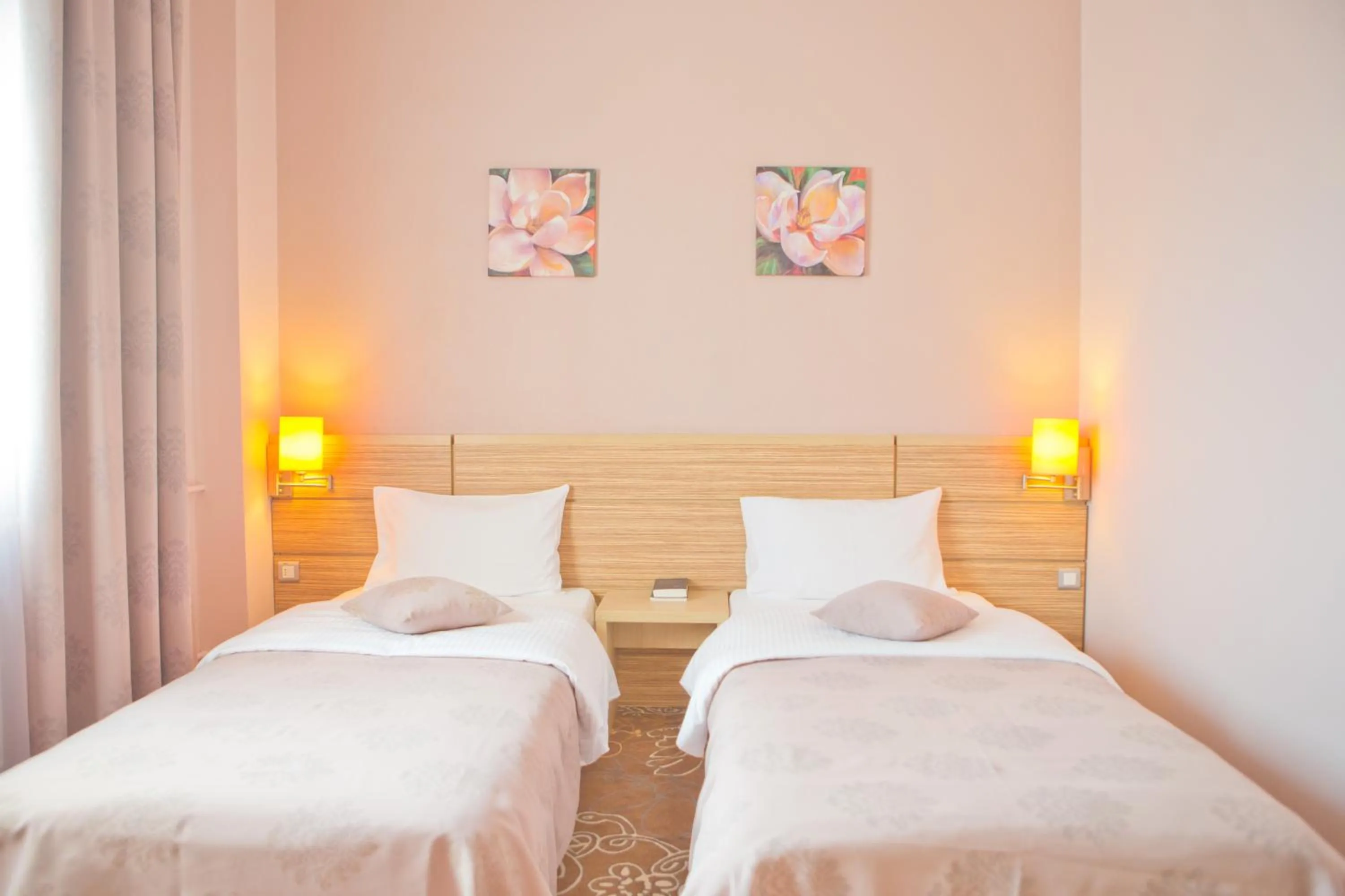 Bed in RIN Central Hotel