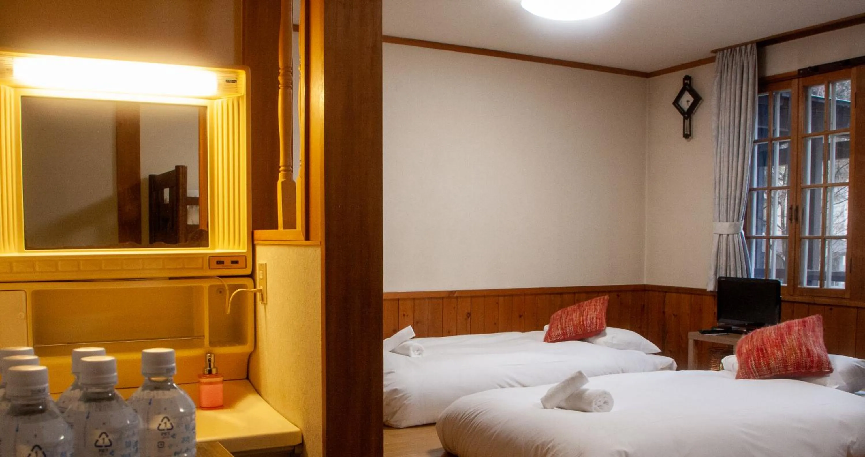 Bed in Kizuna Lodge & BBQ Centre